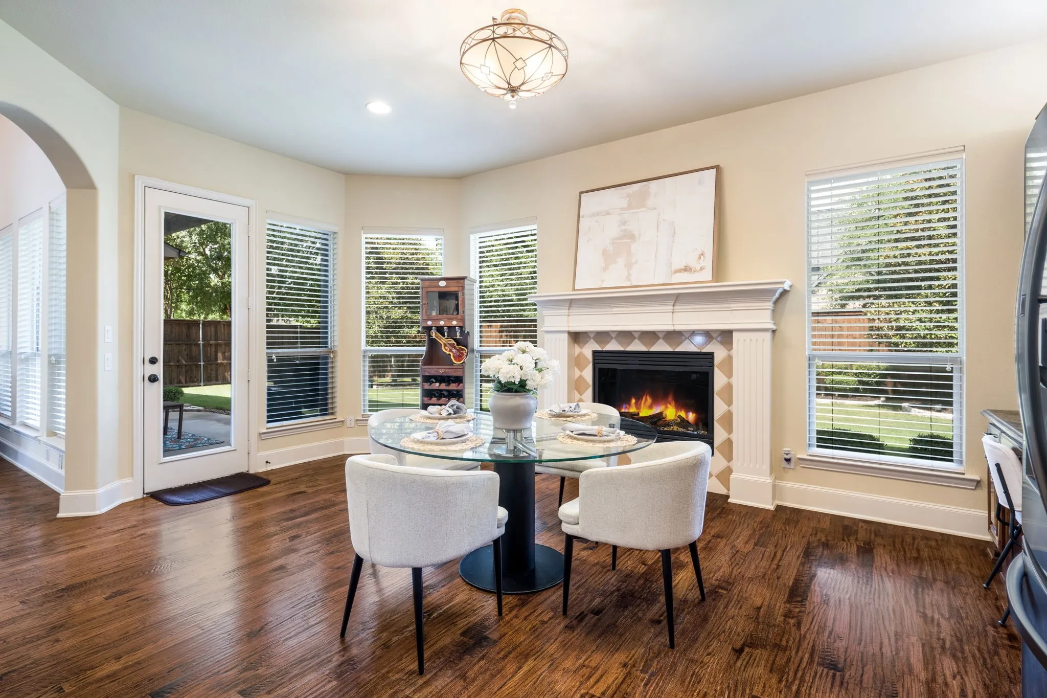 Recessed lighting, ceiling fan, crown molding, bay window, and soft carpet flooring