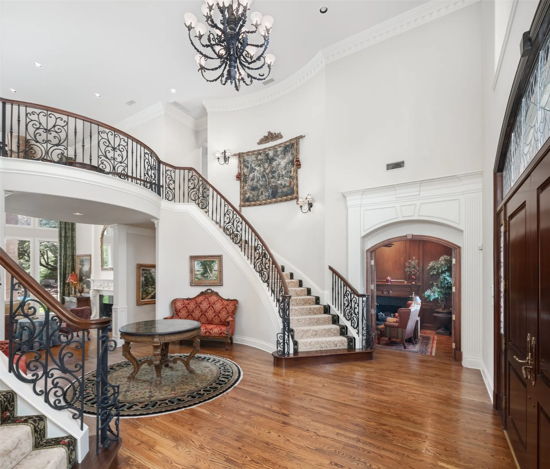 Entry with elegant double staircase