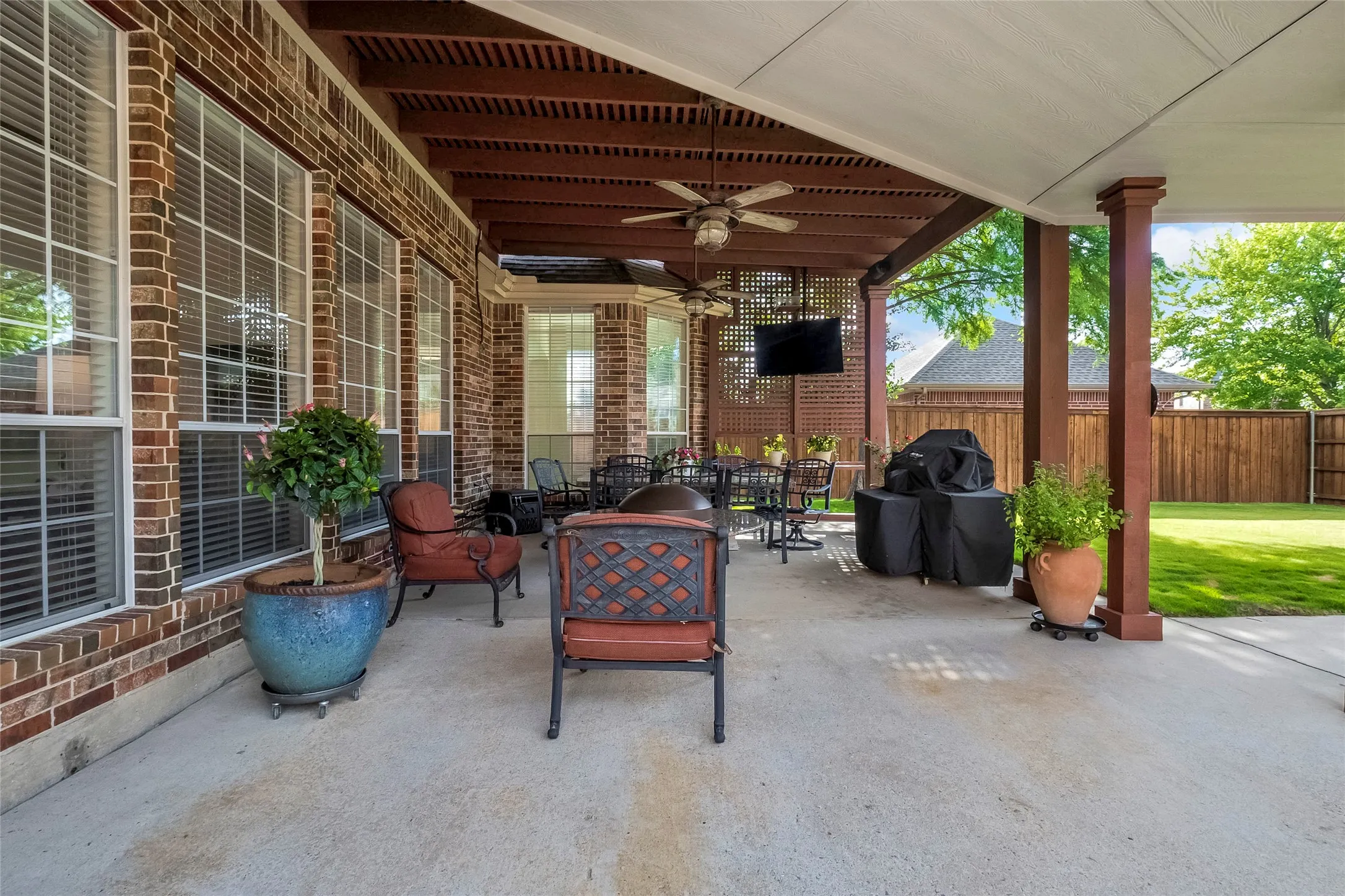 Oversized covered pergola for barbecuing, relaxing or enjoying time with family or friends.
