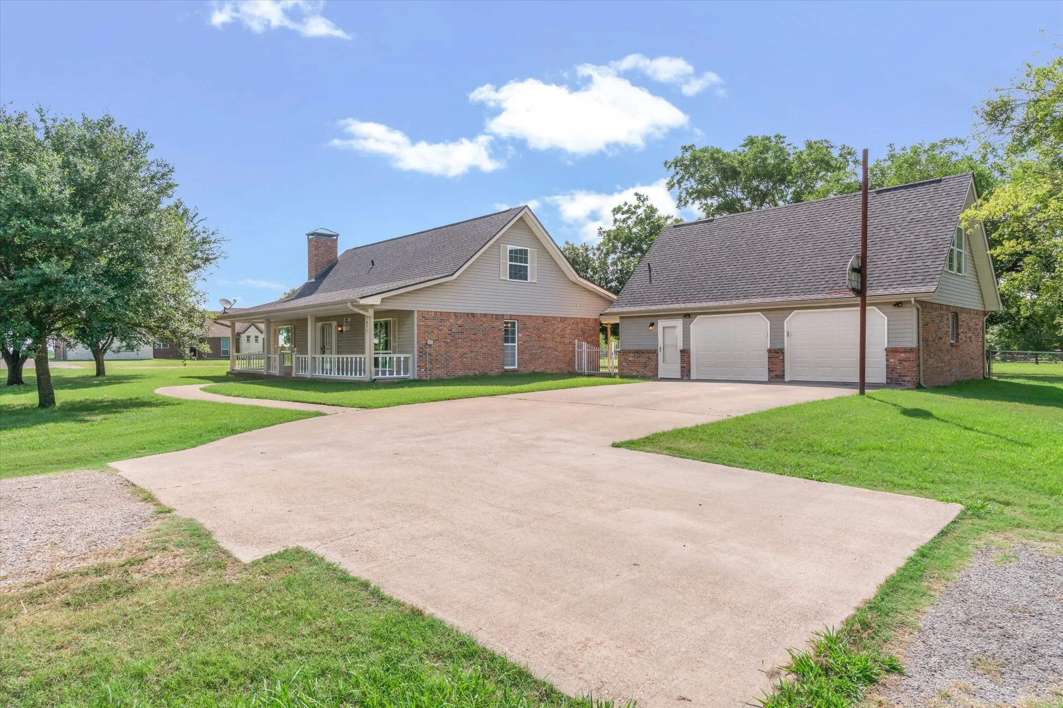 Spacious concrete drive, extra parking.