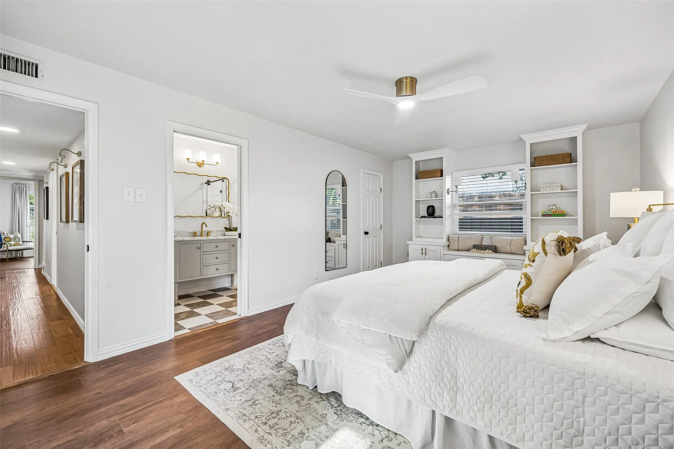 More wooden floors anchor this space...no carpet! The ensuite bath is easily accessible.