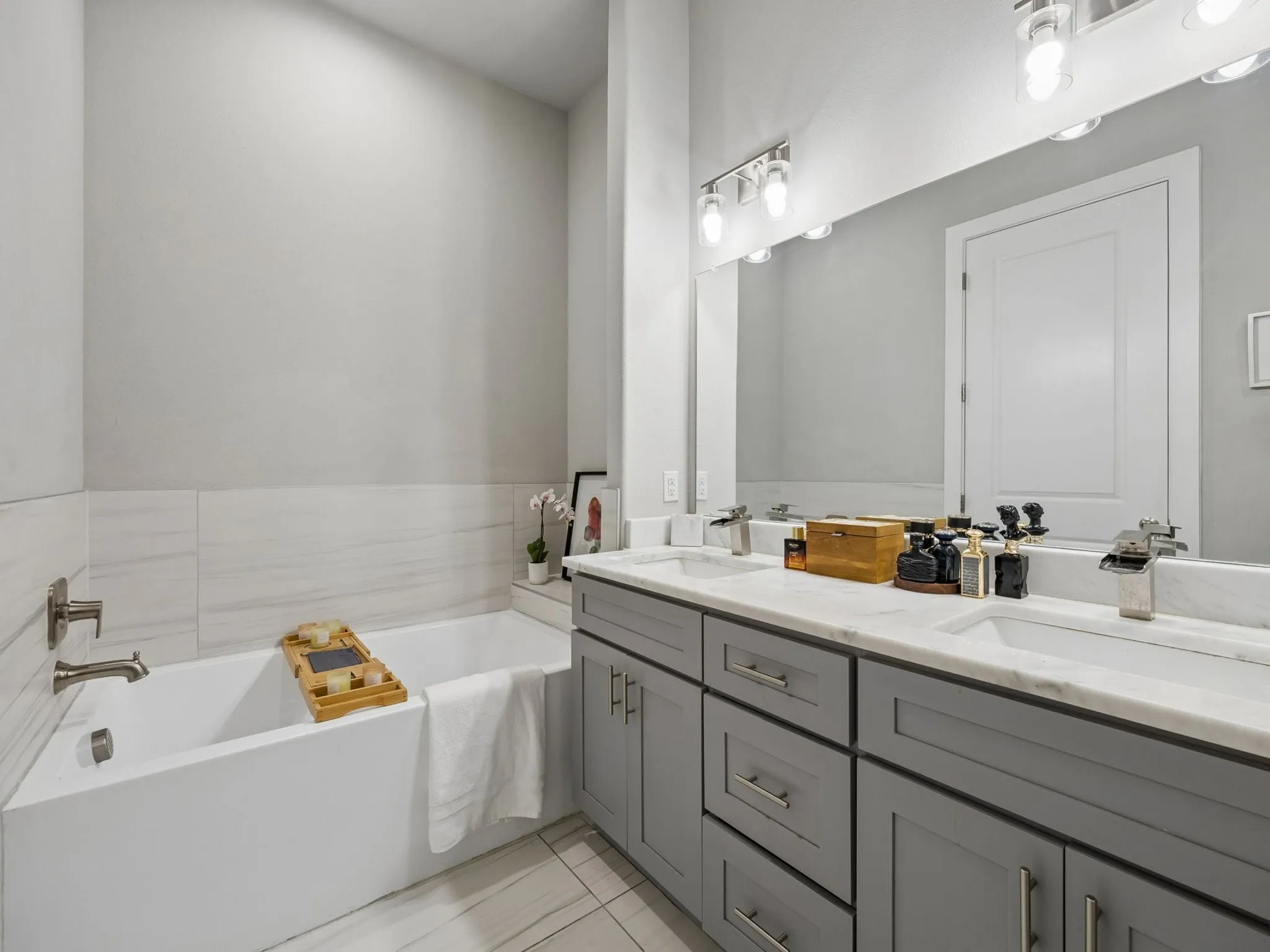 Soaking tub separate from a spa shower