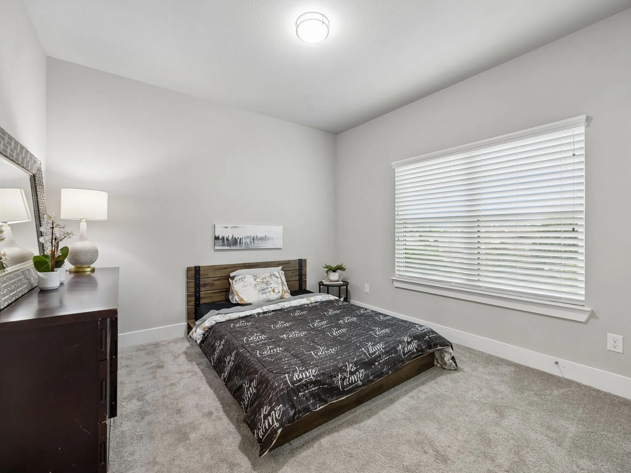 one of two upstairs bedroom with a private attached full bath