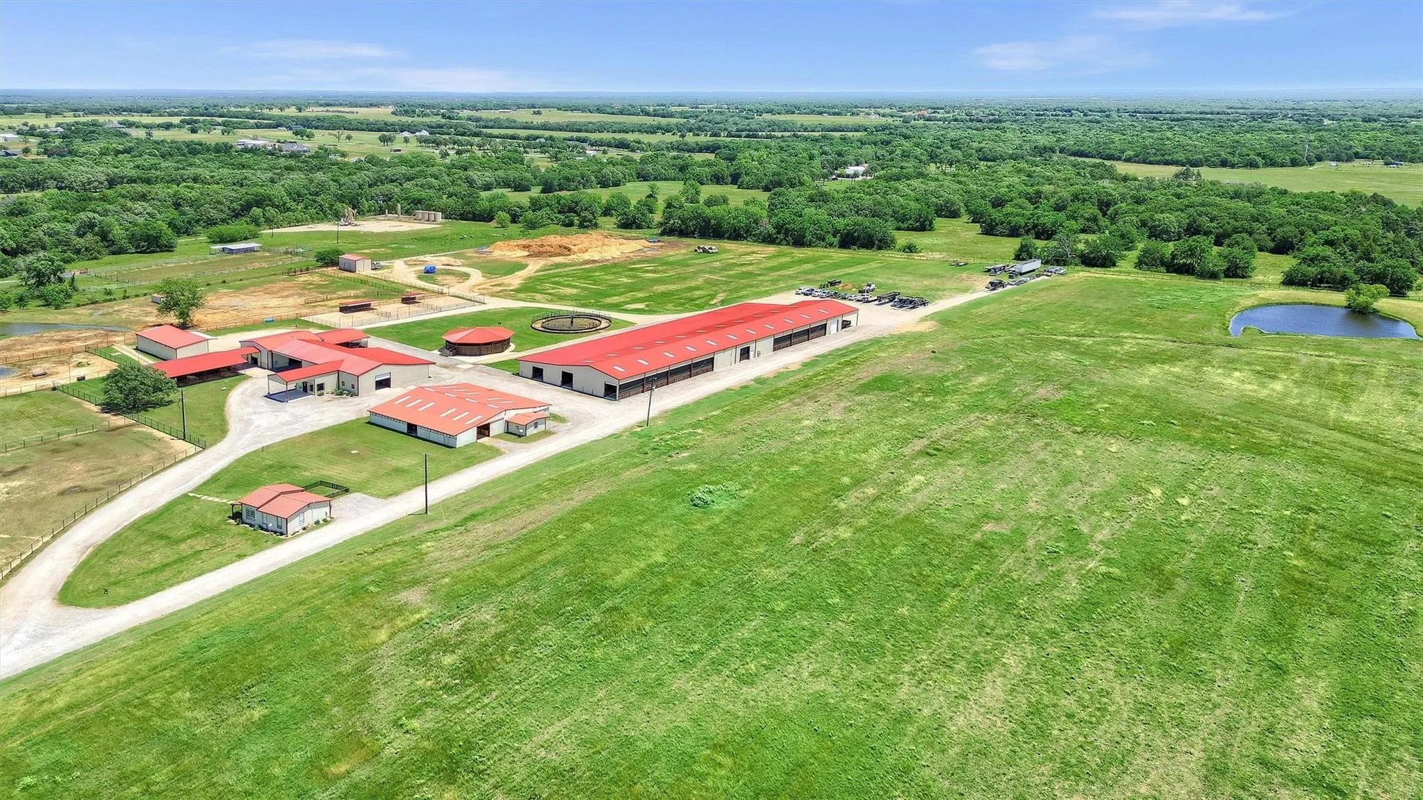 Spacious lounge office for conducting business located convenient to all barns and lab.