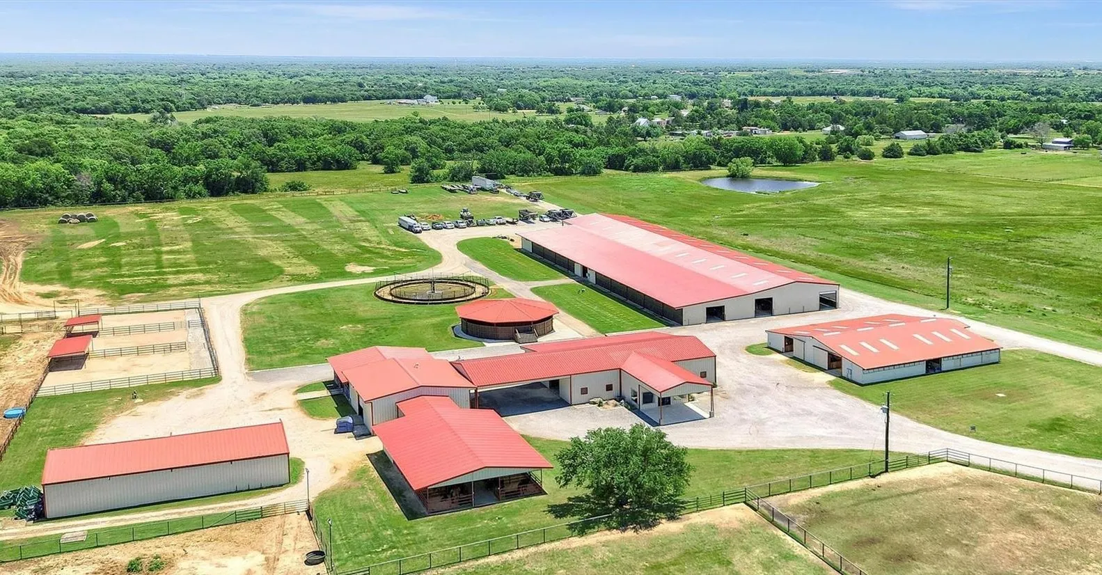 Aerial view from US Hwy 377 - looking east, showing all equine related facilities and buildings.