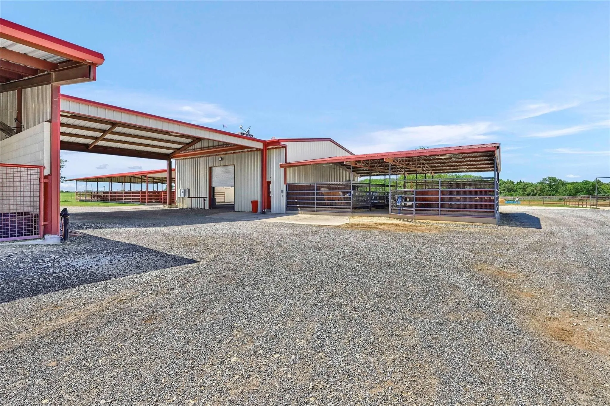 Convenient drive-thru between the shop-barn, mare motel and the office.