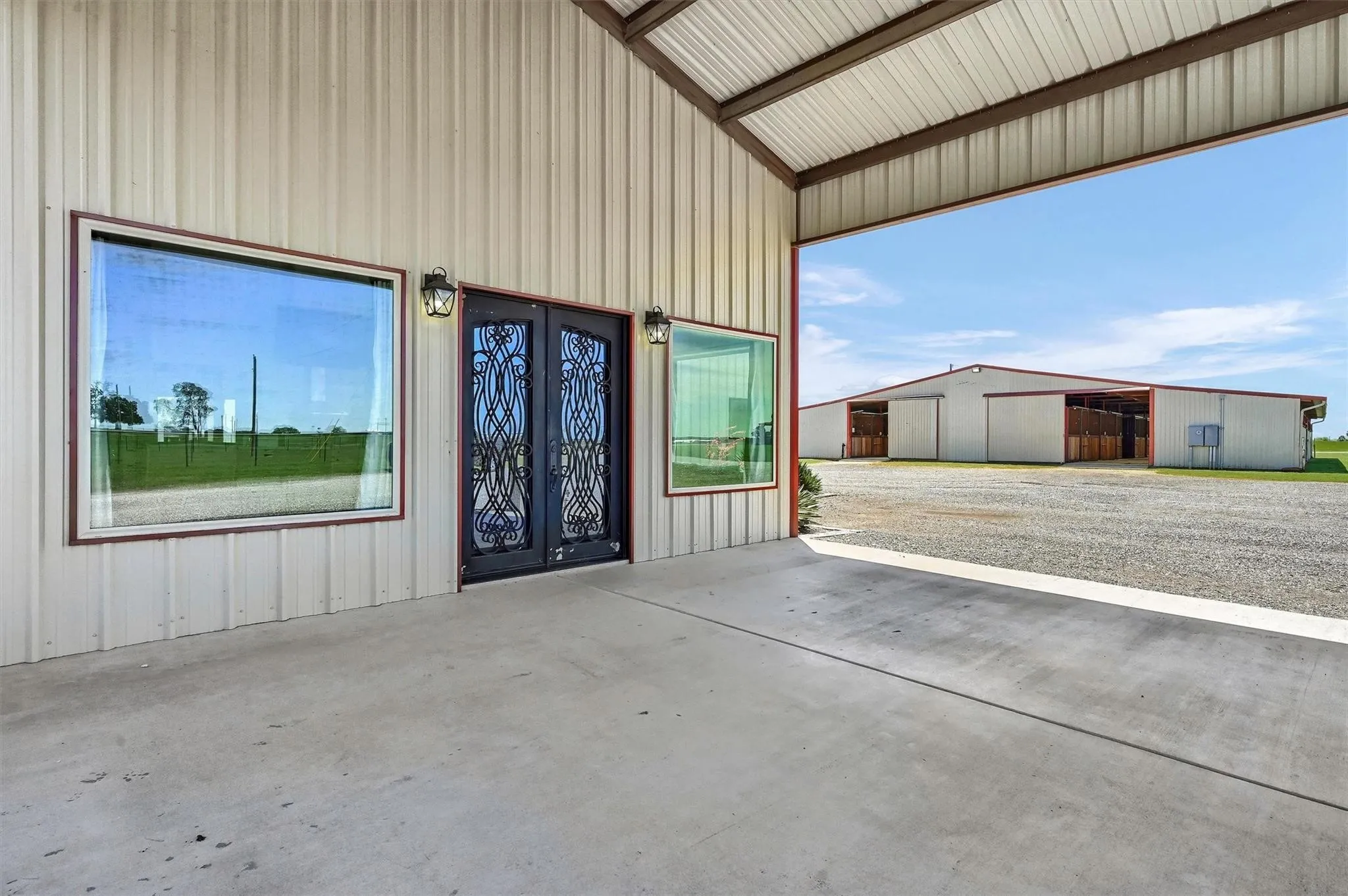 Lounge facility's covered porch with the Show barn to the south.