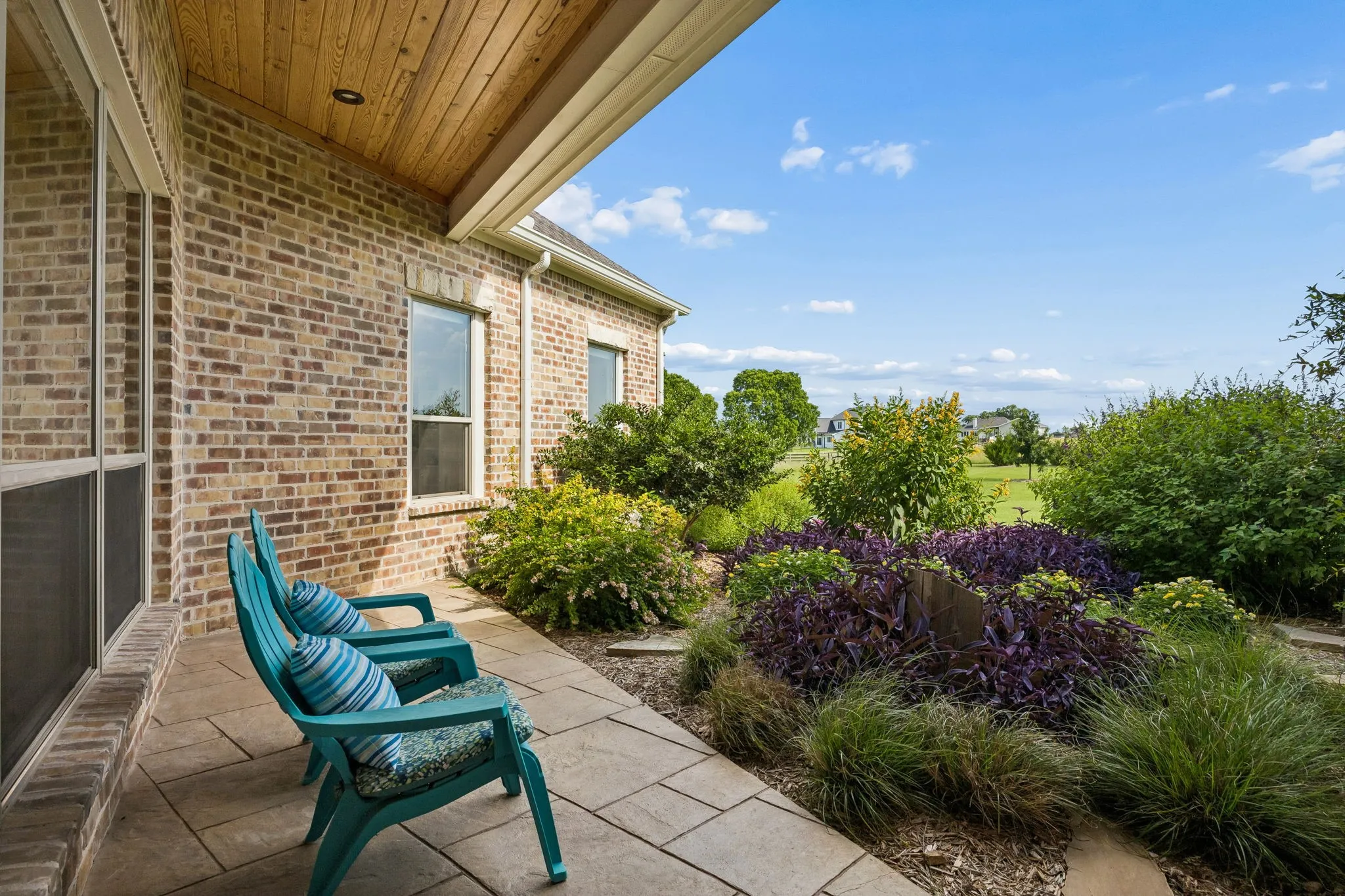 Access your private covered courtyard patio from the gallery hallway where you can relax among peaceful gardens that display color and texture year-round.