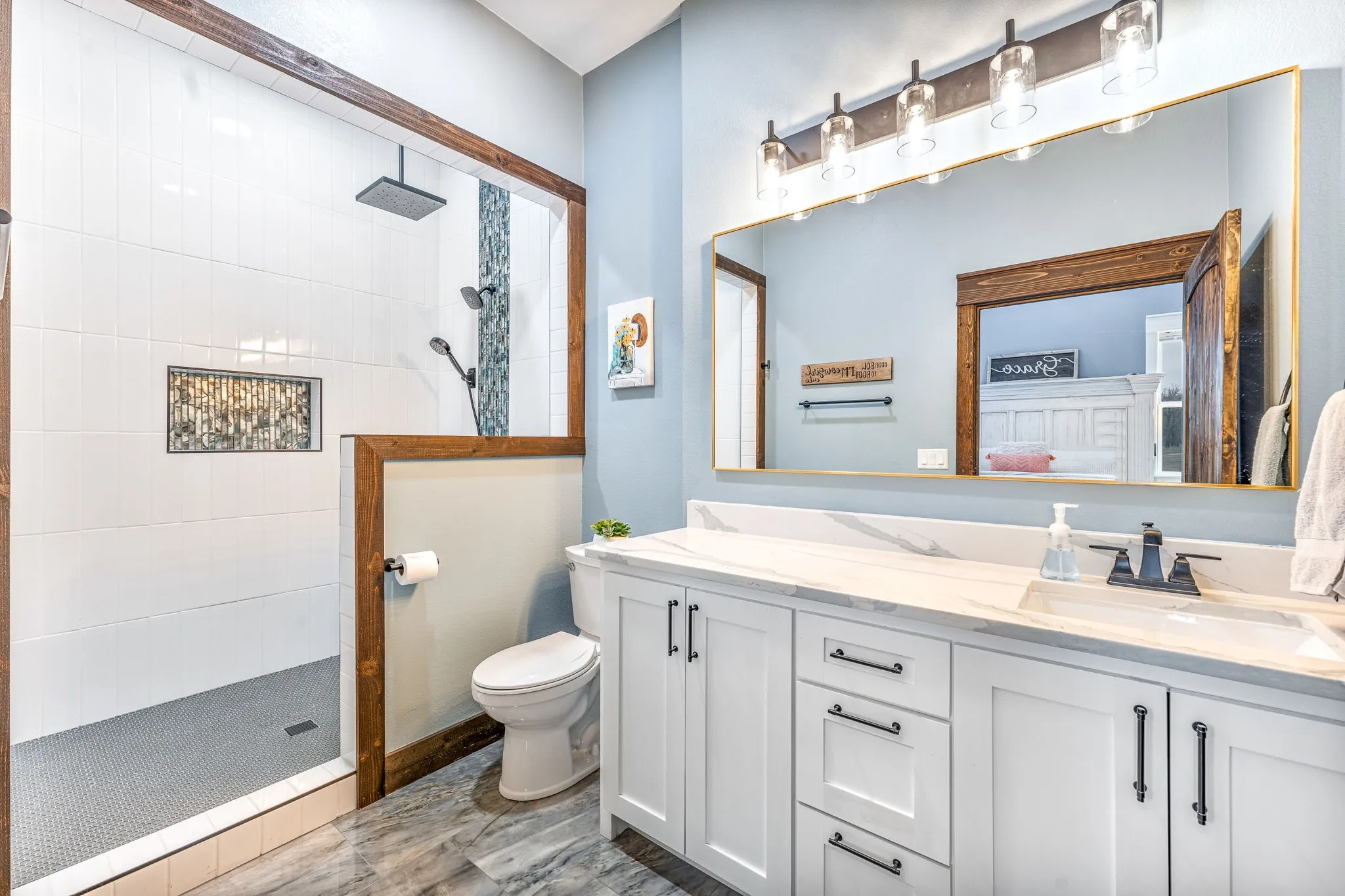 Bathroom with a walk in shower and double vanity