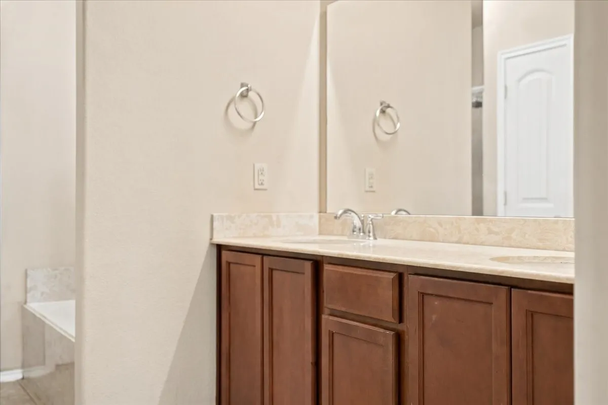 Primary bath with dual sinks.