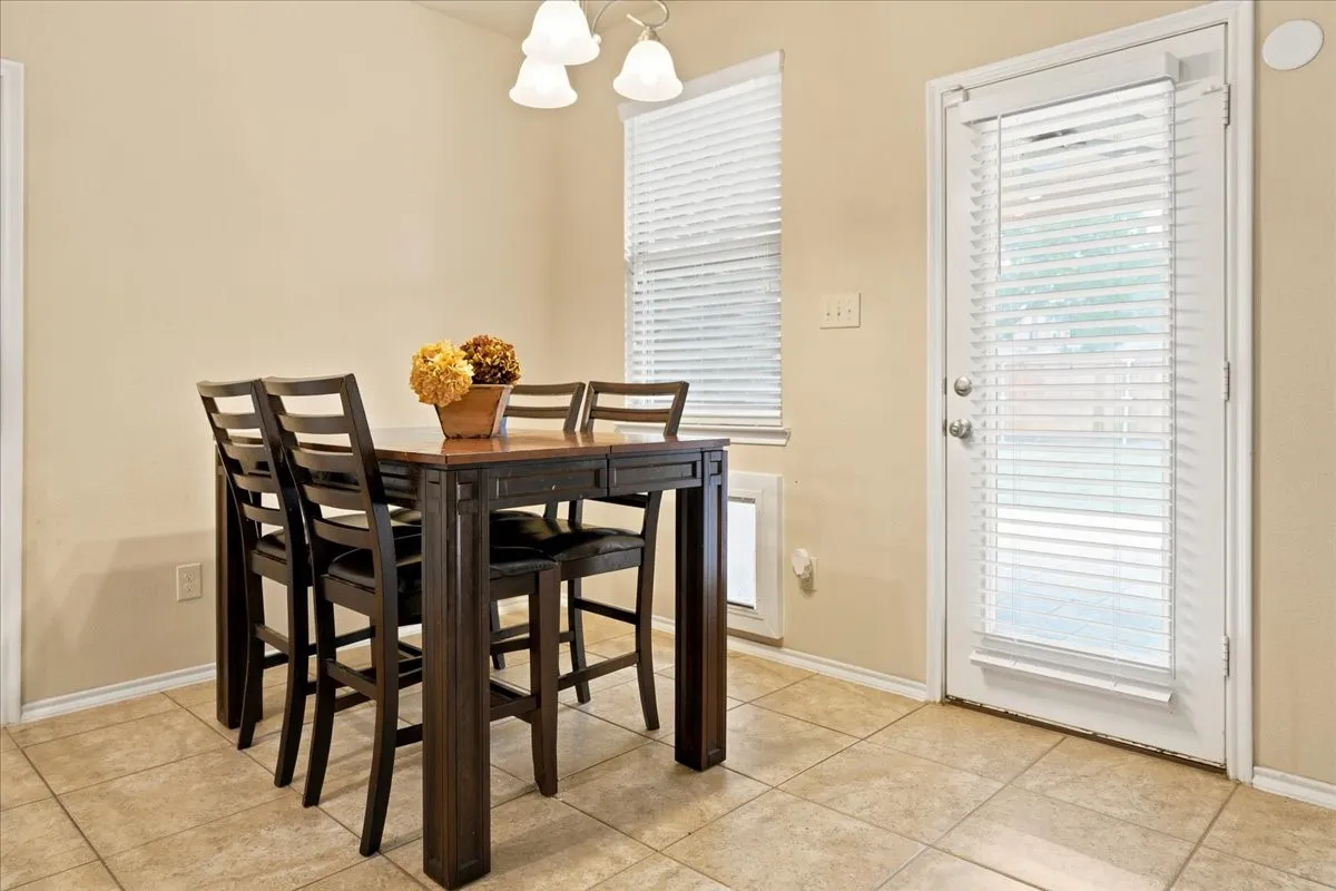 Breakfast nook open to kitchen and family room