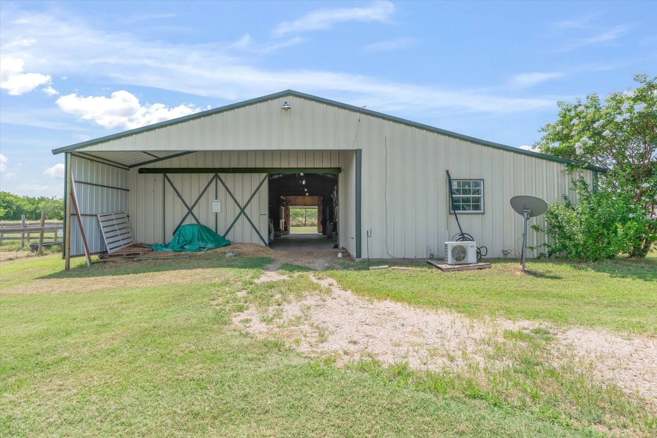 For the equestrians, 6 stall horse barn with small apartment.