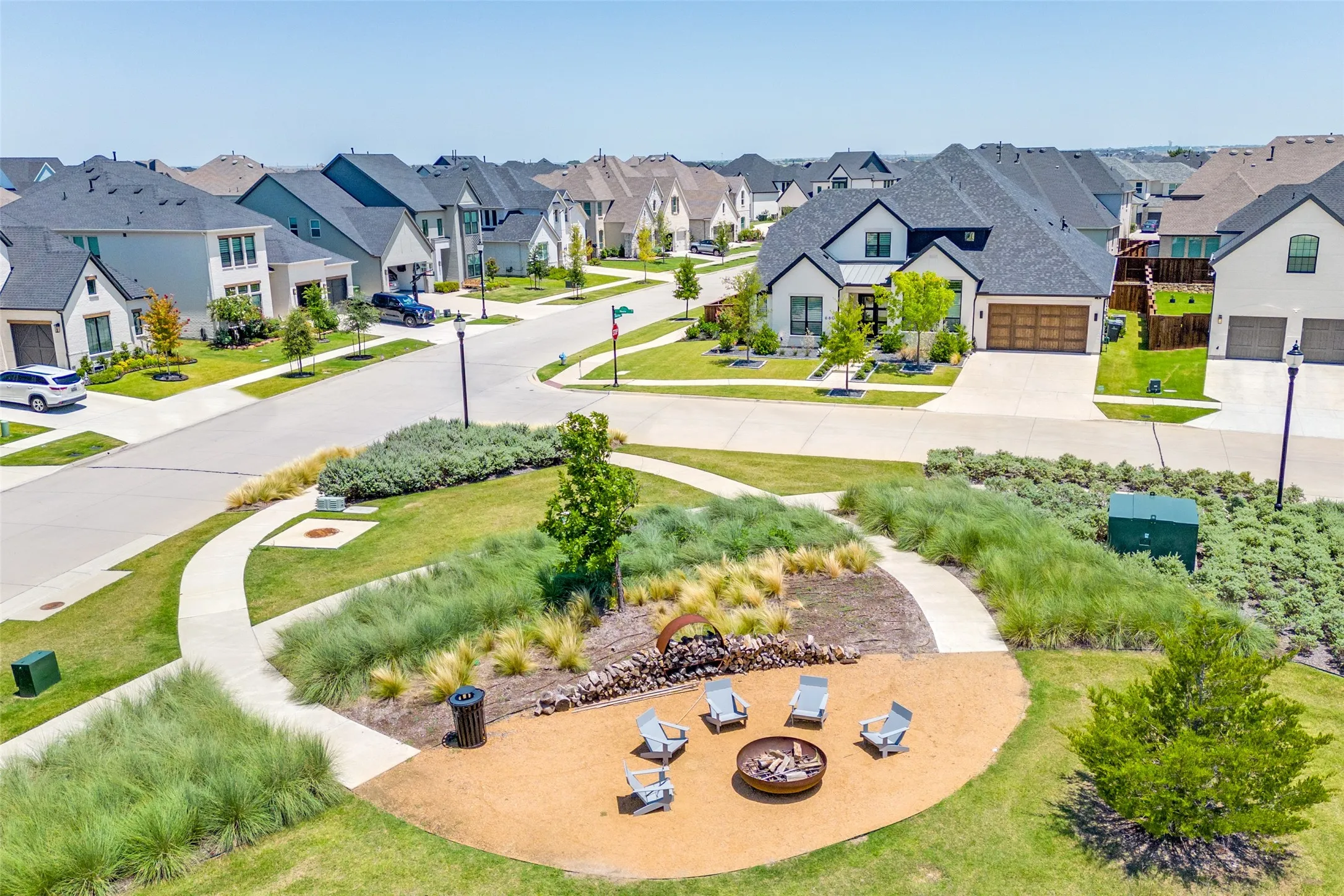 Neighborhood fire pit at the pocket park creates the perfect gathering place just across from your front door.