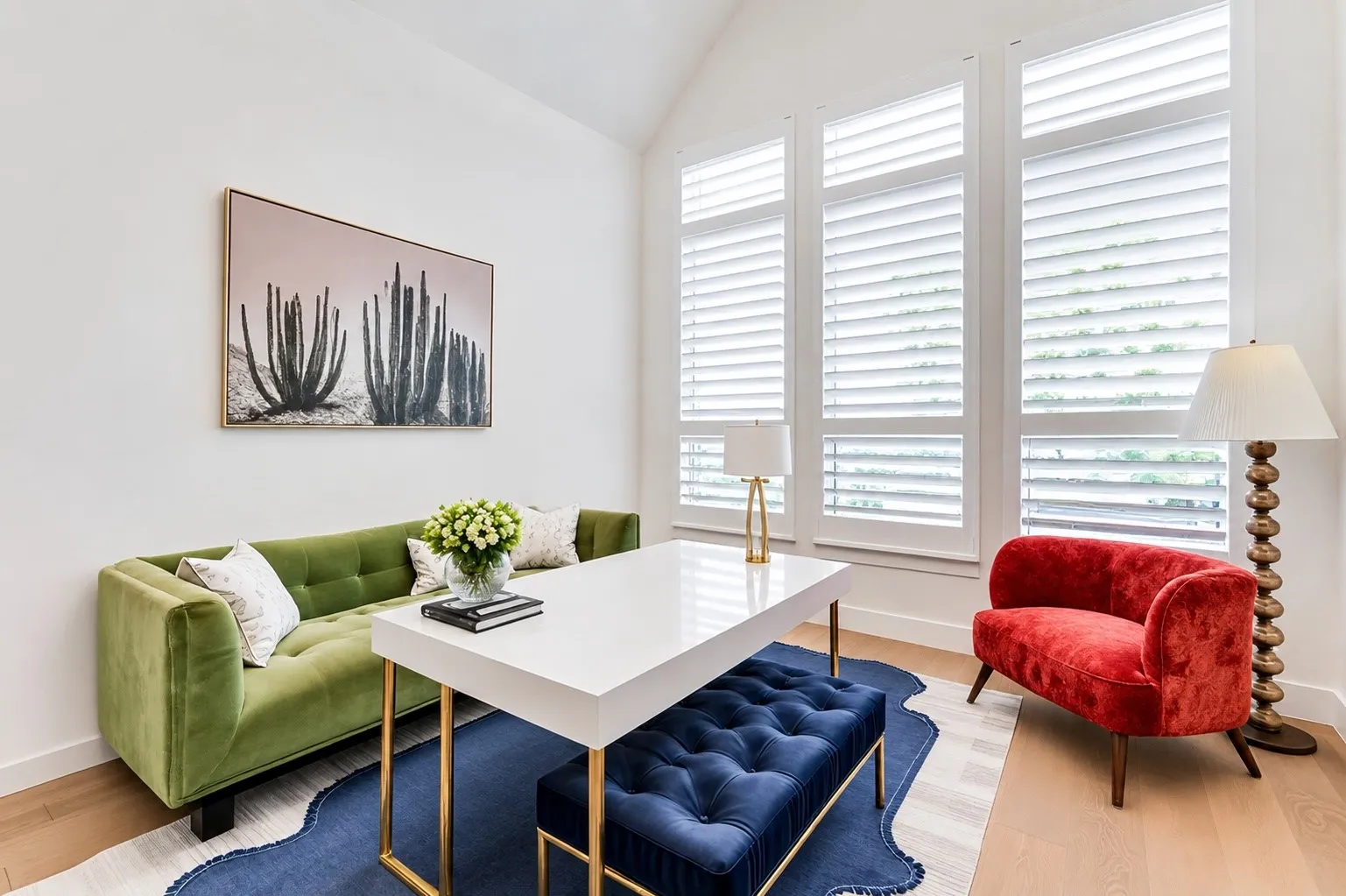 A platformed private front office with plantation shutters and three oversized windows creates an inspiring work-from-home space. Some furniture, accents and accessories were Virtually Staged.