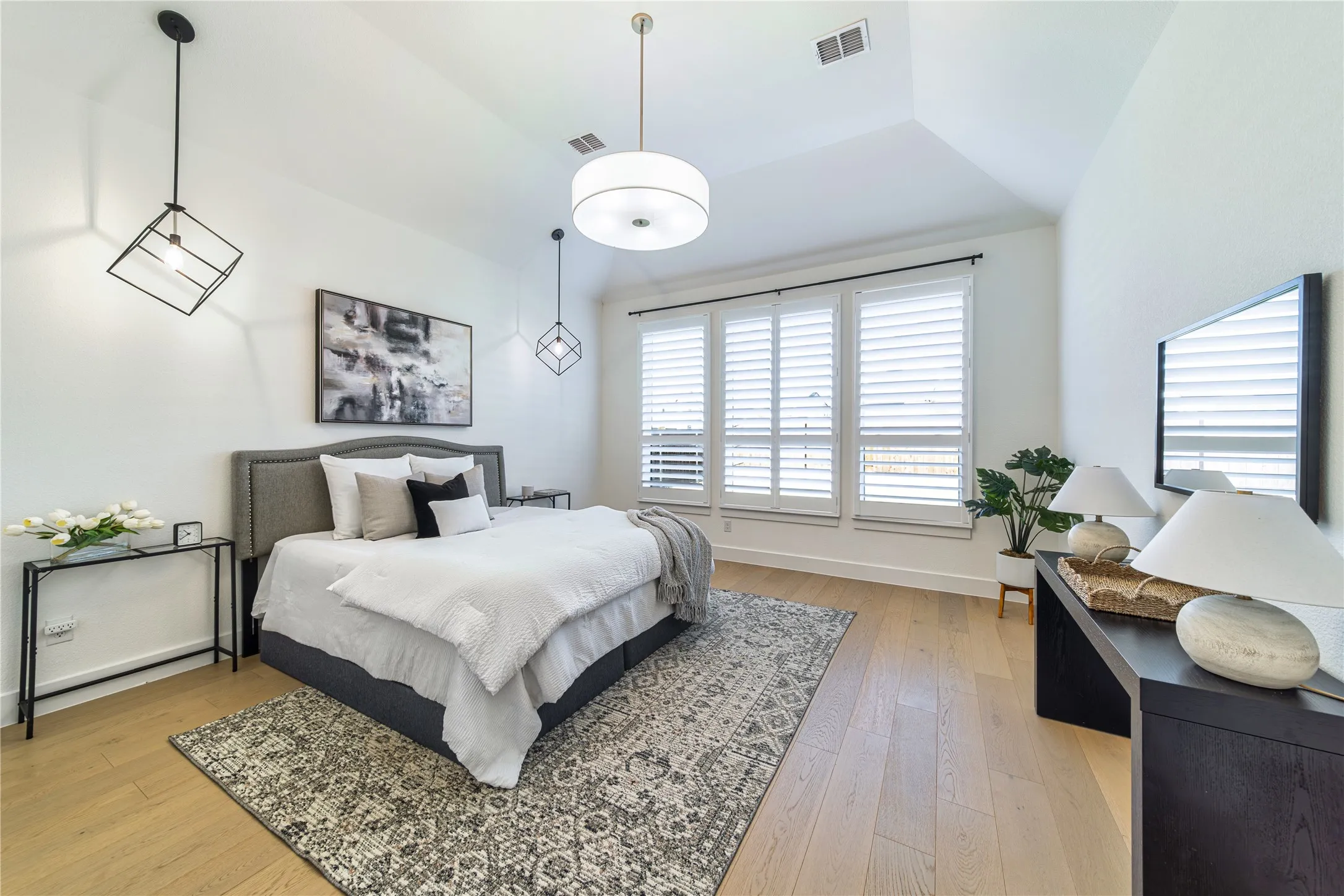 Your private retreat features white oak flooring, pendant reading lighting and plantation shutters for comfort and elegance.