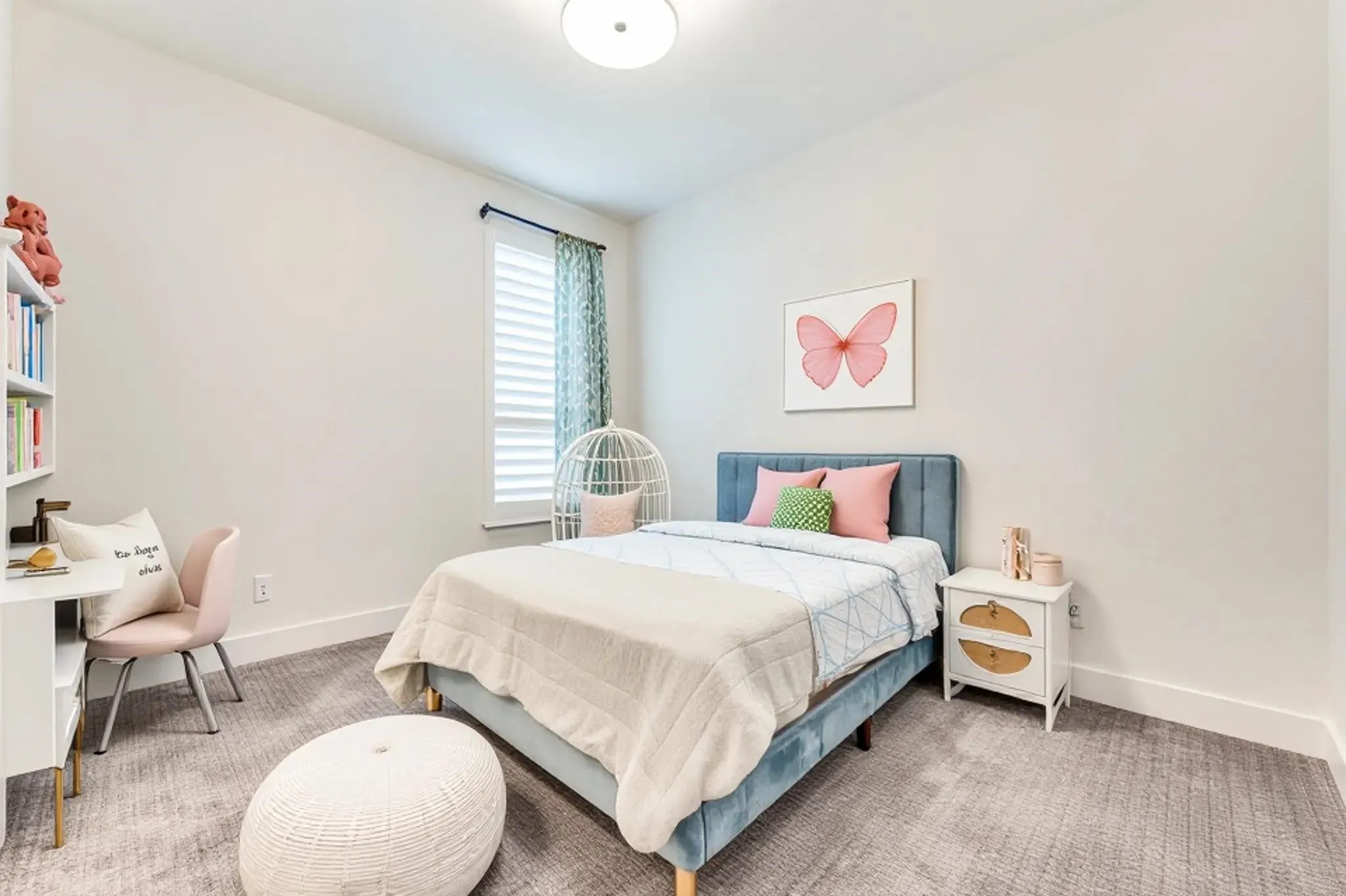 Spacious secondary bedroom with abundant natural light and generous closet space. Some furniture, accents and accessories were Virtually Staged.