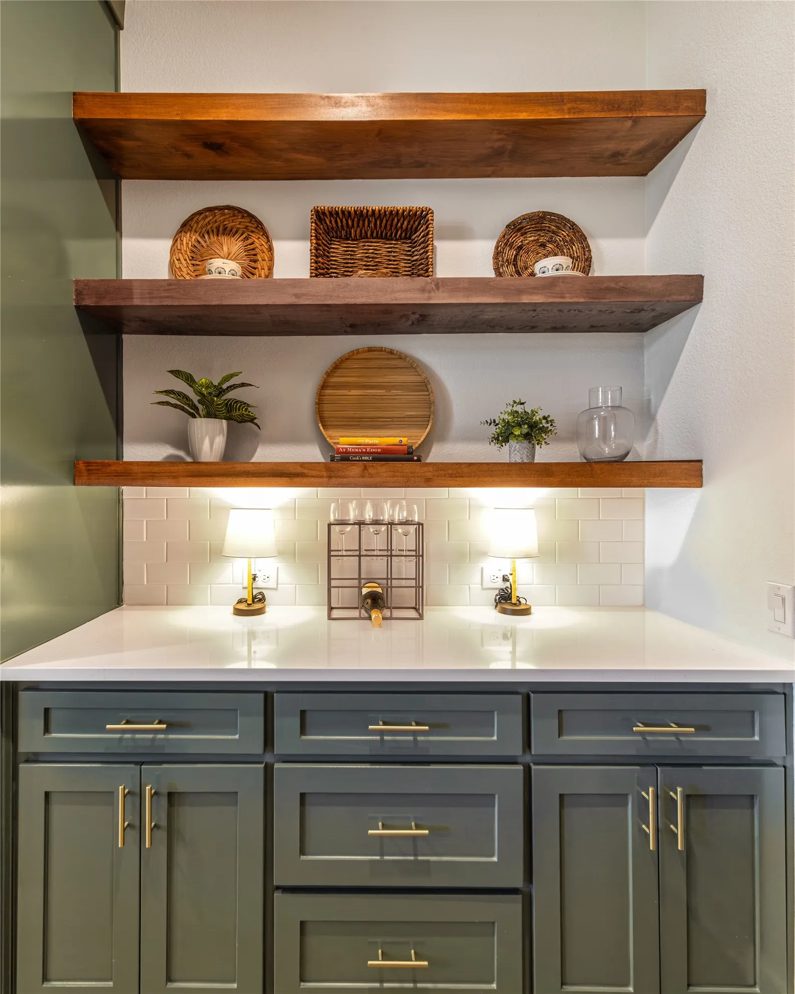 A beautifully appointed butler's pantry provides additional storage, serving space and effortless entertaining.