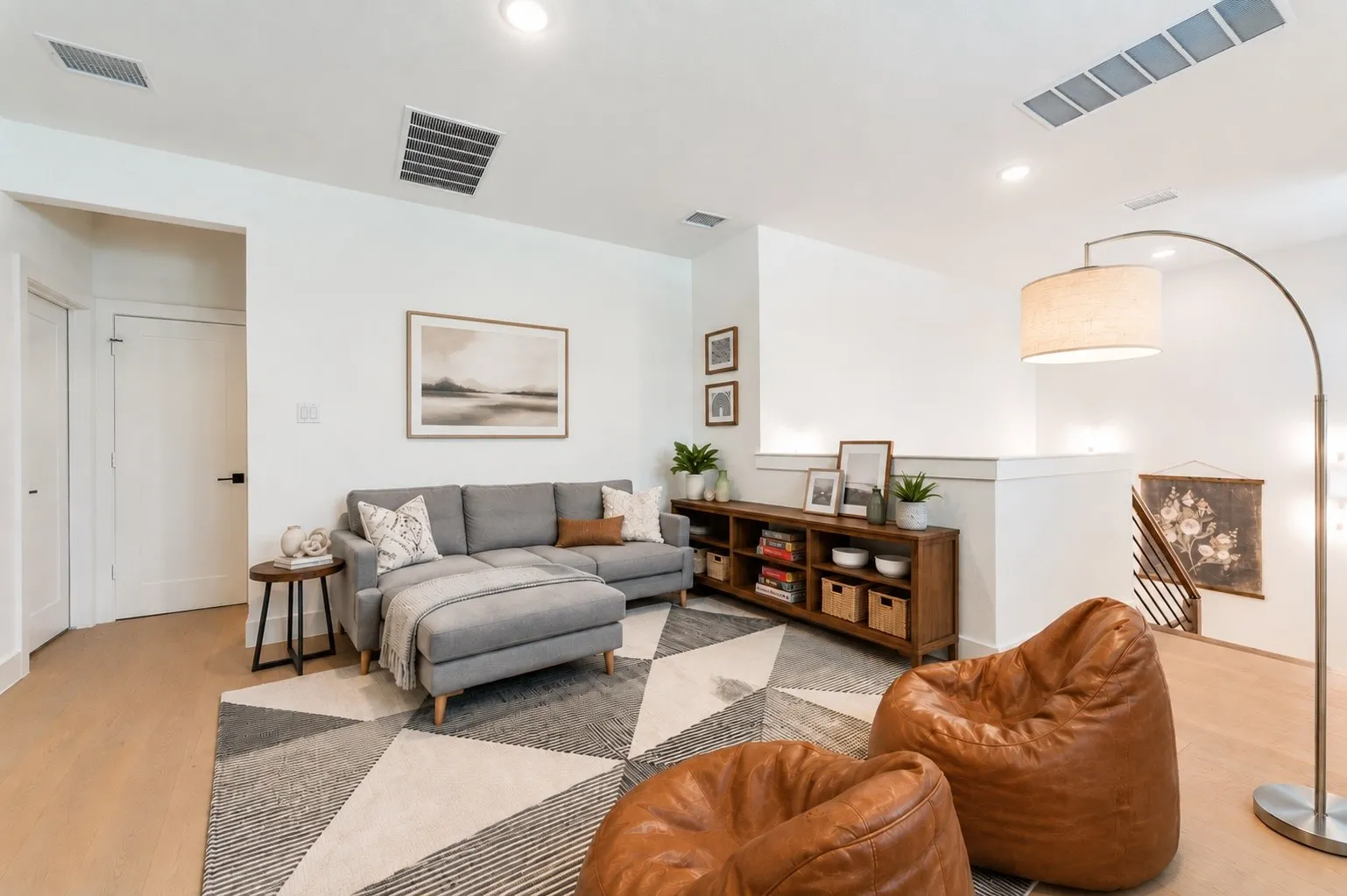 Hardwood flooring and open design provide endless flexibility for today's evolving lifestyle. Furniture, accents and accessories were Virtually Staged.