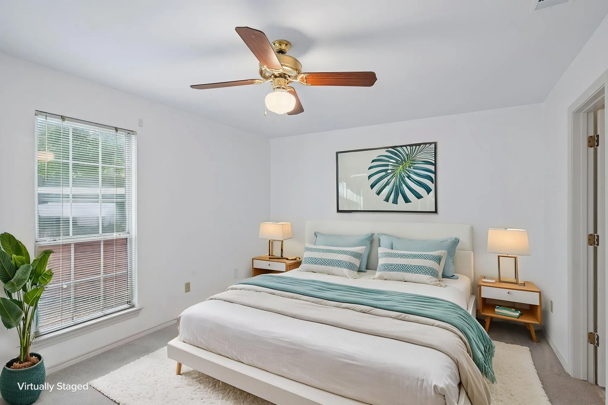 Bedroom featuring a ceiling fan with light fixture, window with blinds, and light-colored flooring