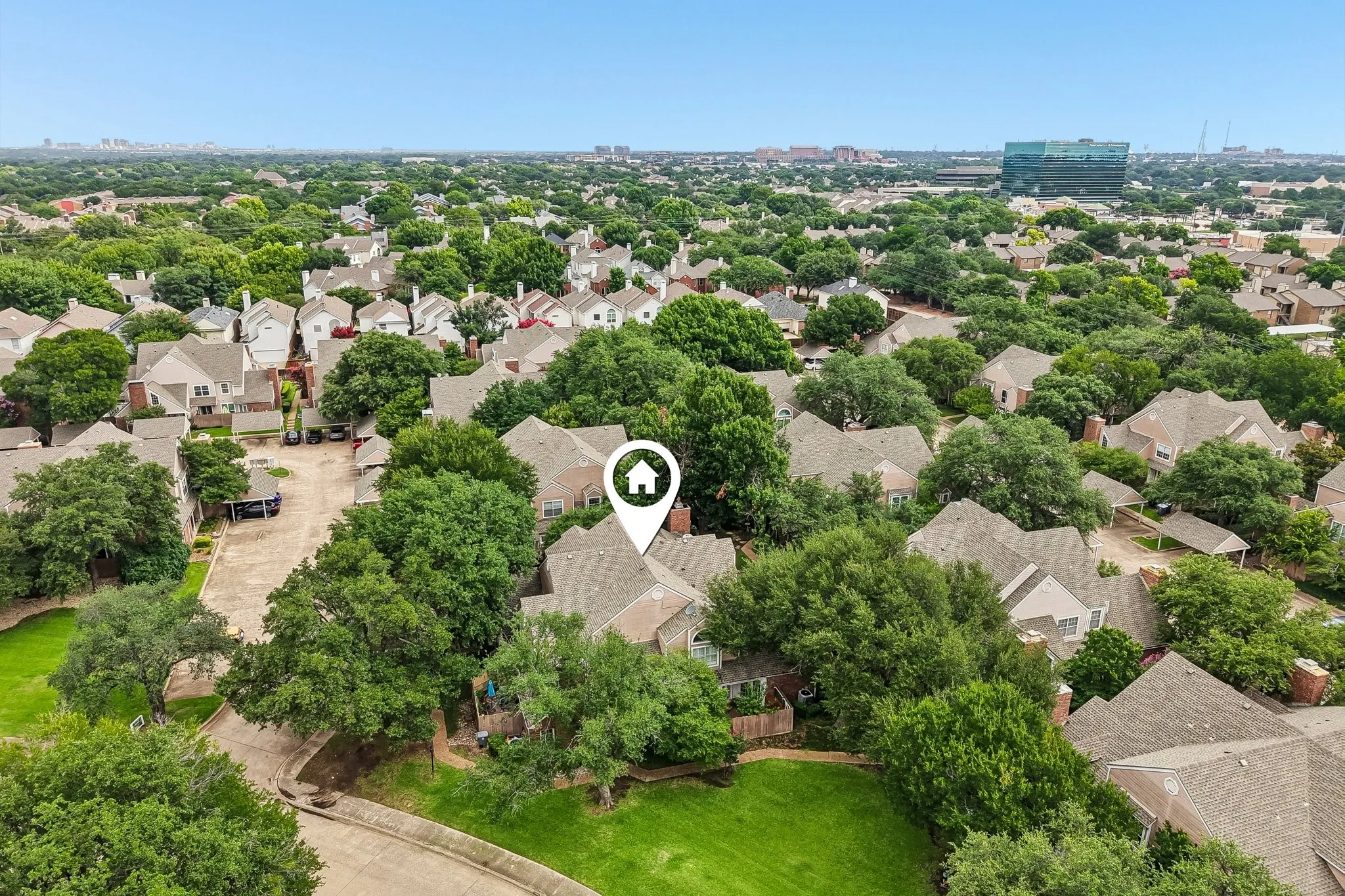 Residential property in a developed neighborhood with mature tree coverage