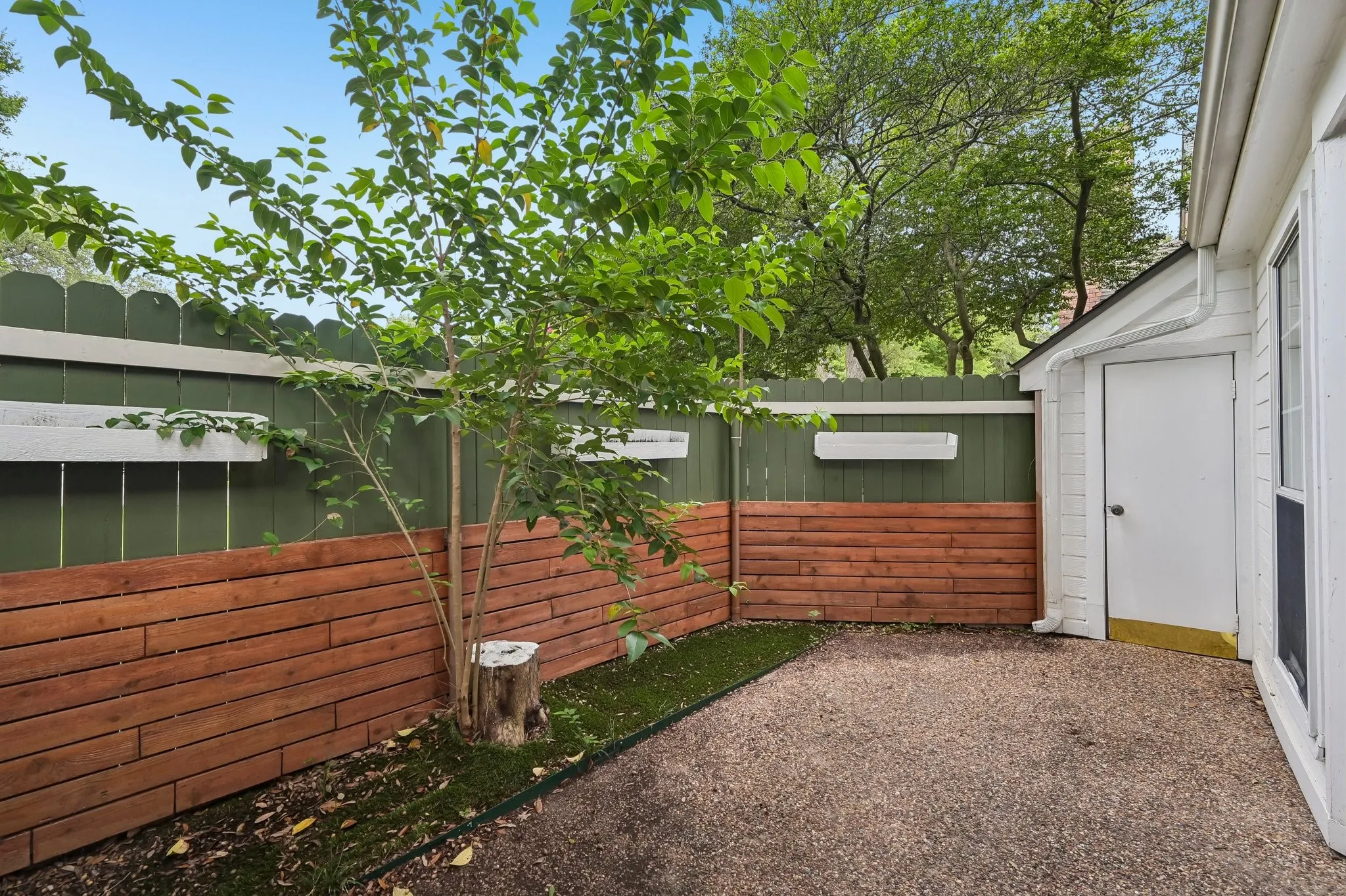 Private, low-maintenance patio area. Includes outdoor storage.