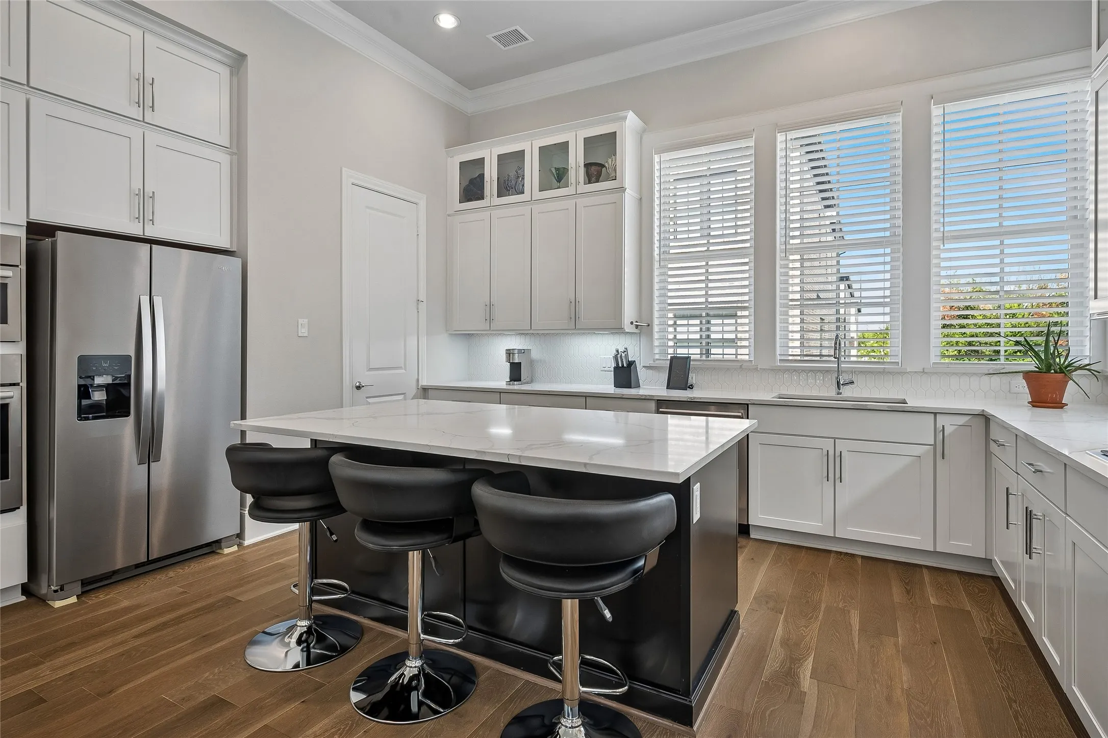 Lots of windows in Kitchen make it light and bright. Refrigerator will remain.