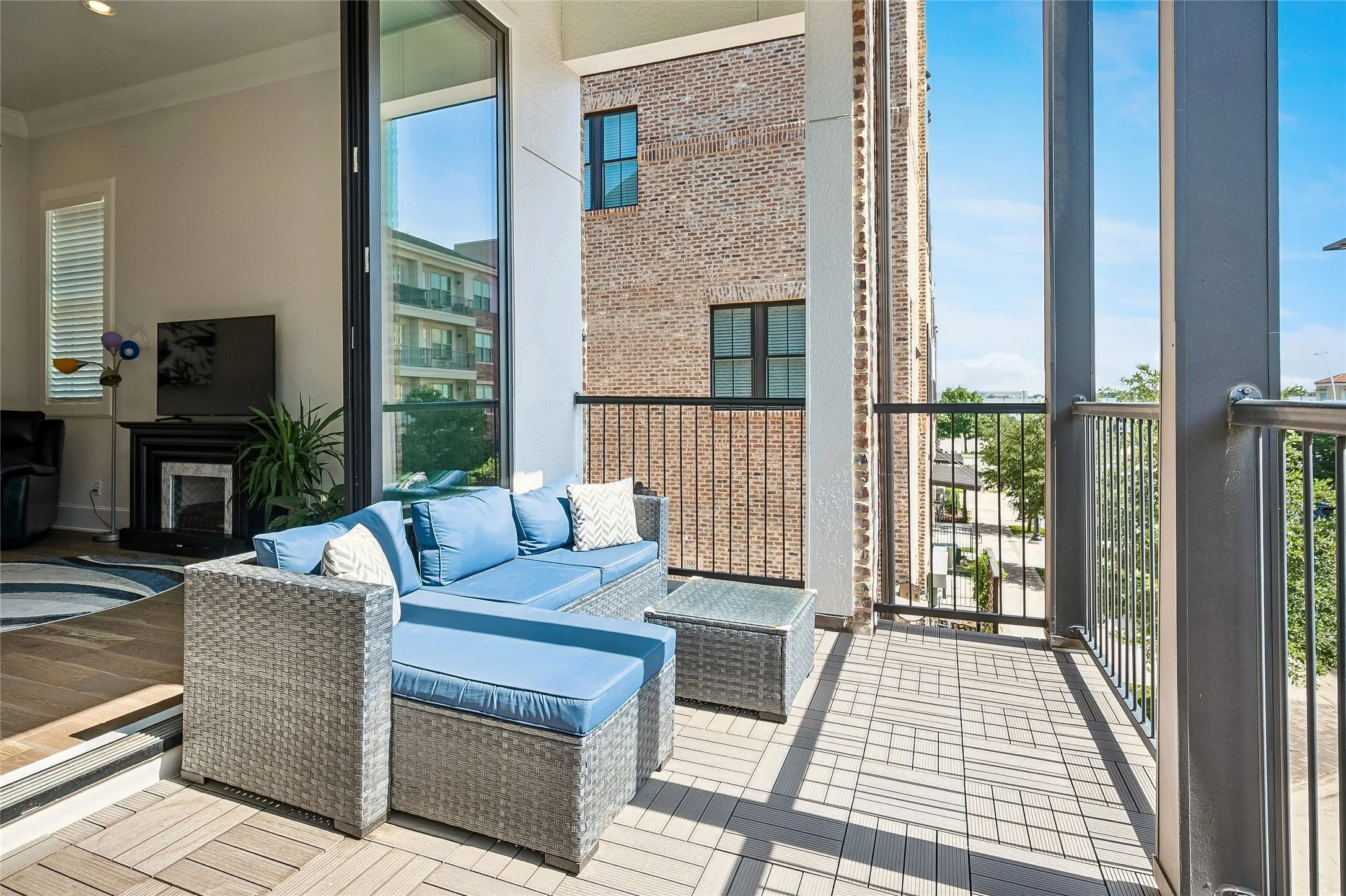 Balcony overlooking Addison, sliders open to family room