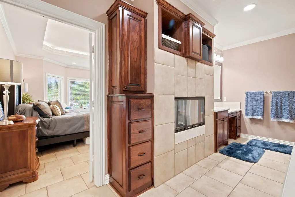 Primary suite with double sided fireplace