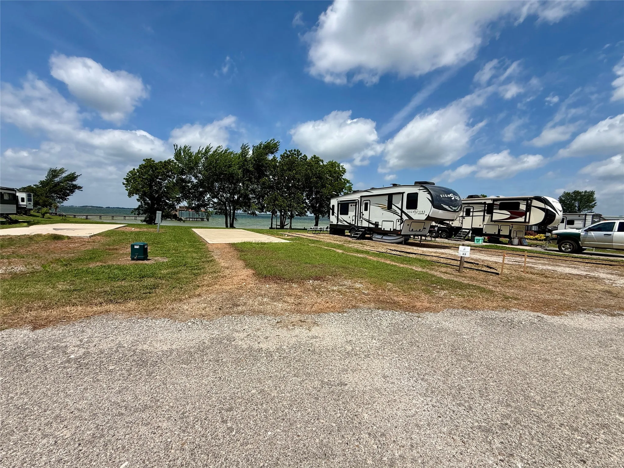 Wide view of the RV site and waterfront.