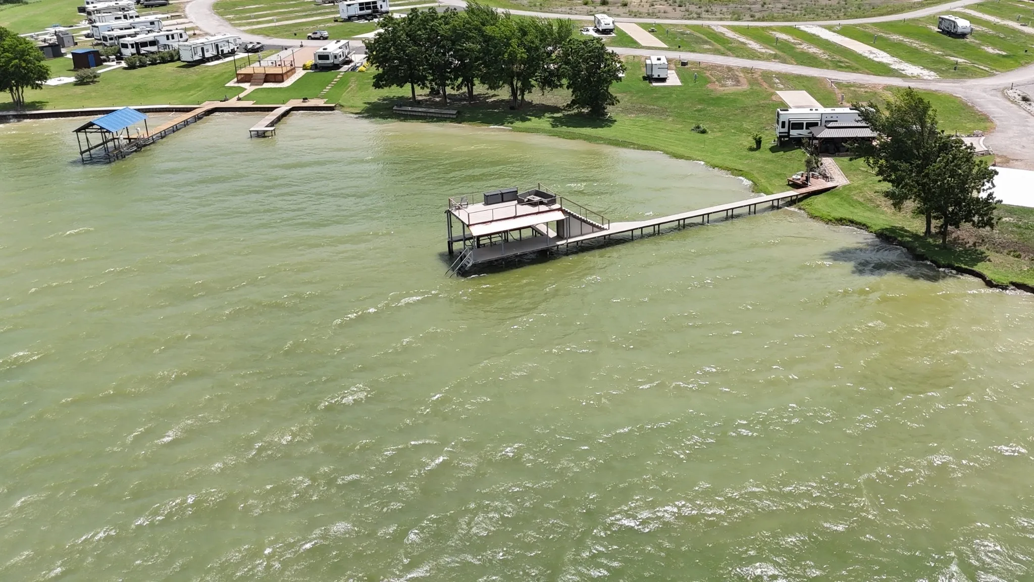 Elevated view of shaded lot shoreline.