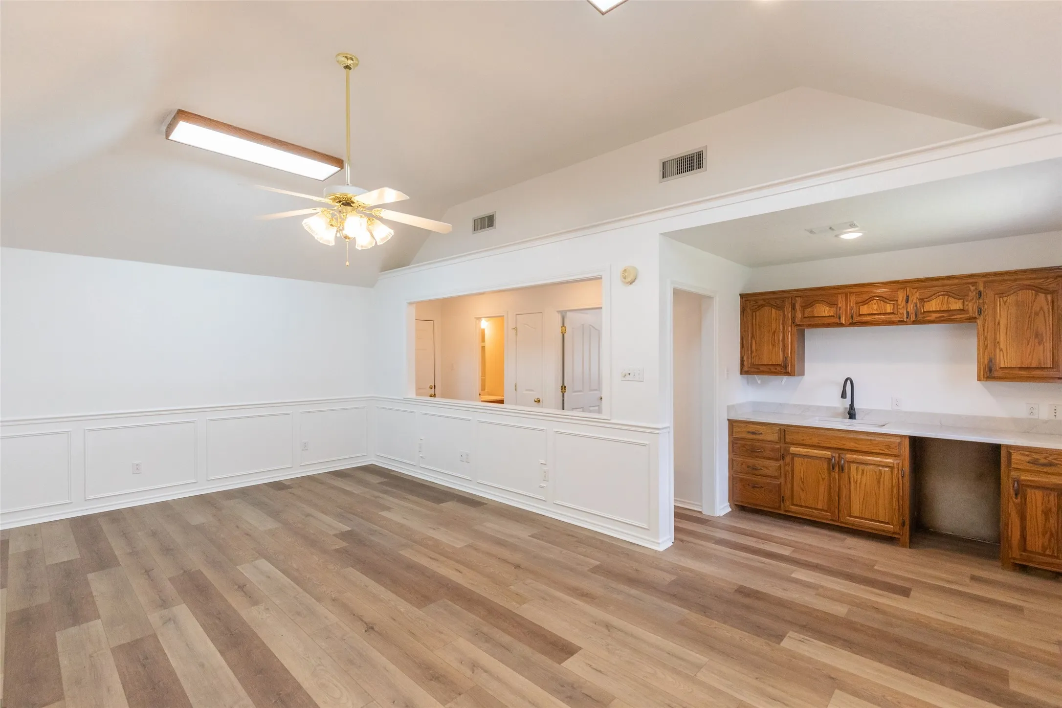 Guest kitchenette. Space in cabinet was intended for compact refrigerator, however would be easy to install a 2 burner oven unit.