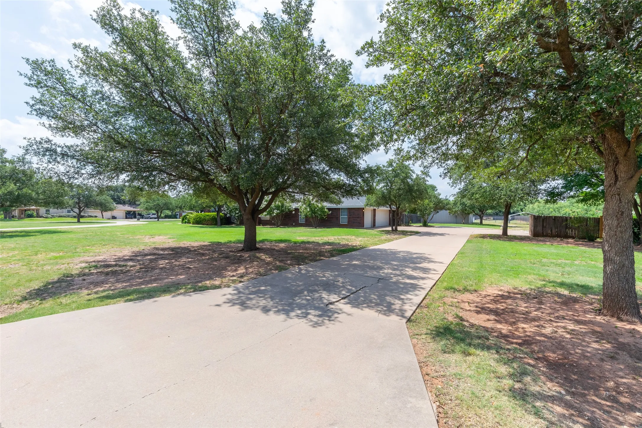 Great trees surround this home.