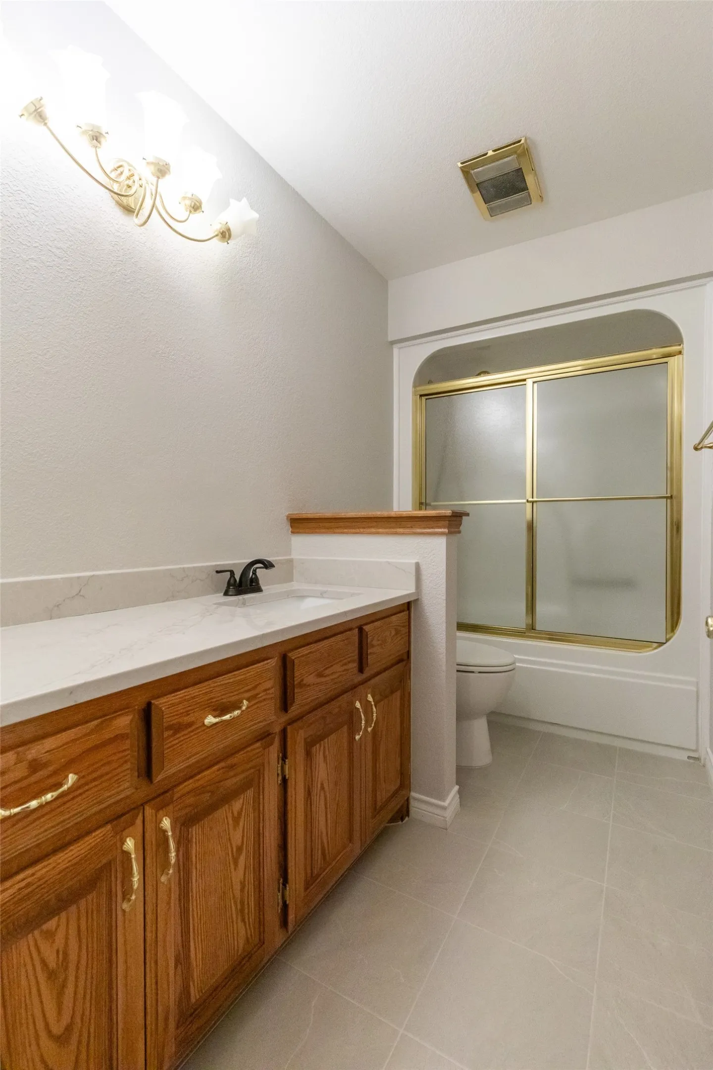 This bath is in the hall way. It features a built-in linen cabinet, not pictured.