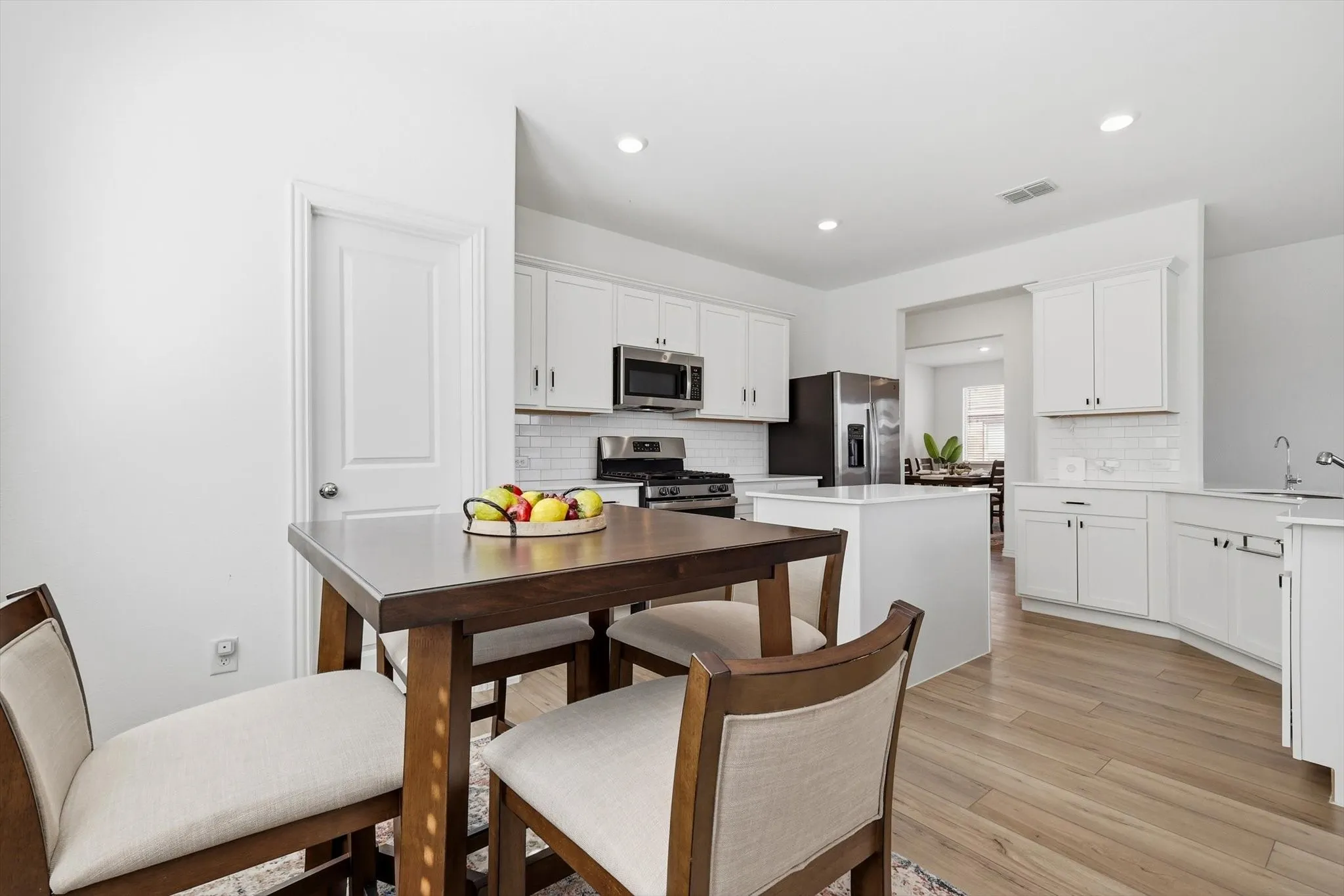 The walk-in pantry is ahead.