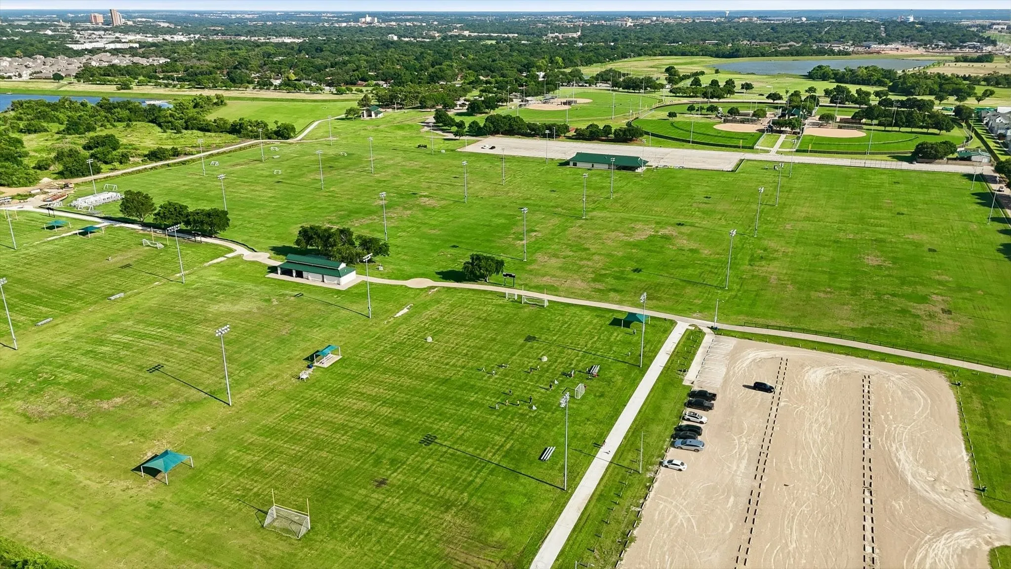 View of nearby North Lake parks with soccer and baseball fields as well as a tennis center with pickleball courts. Picnic and grill opportunities are offered as well!