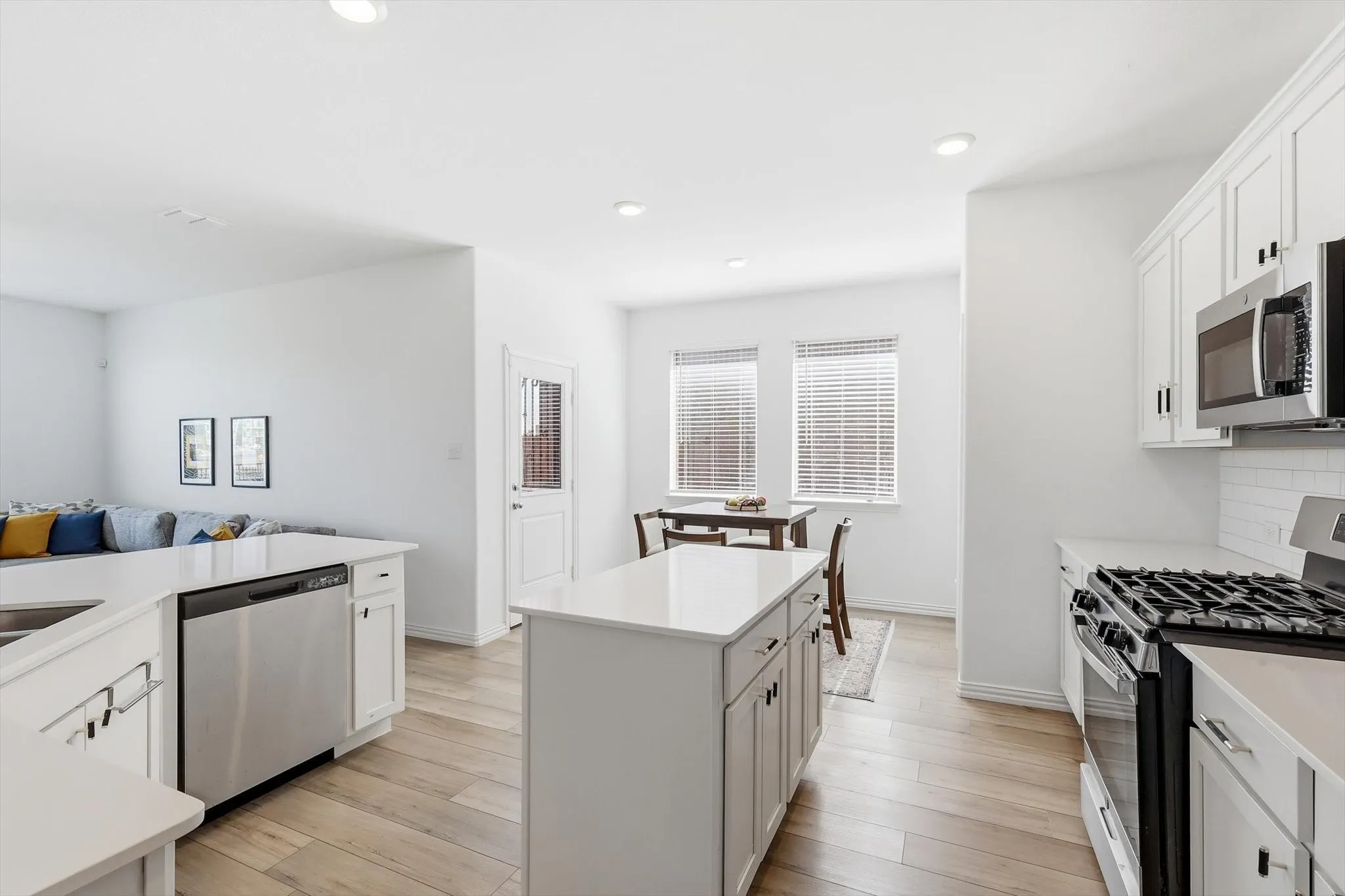 This functional kitchen with center island can accommodate one cook or several!