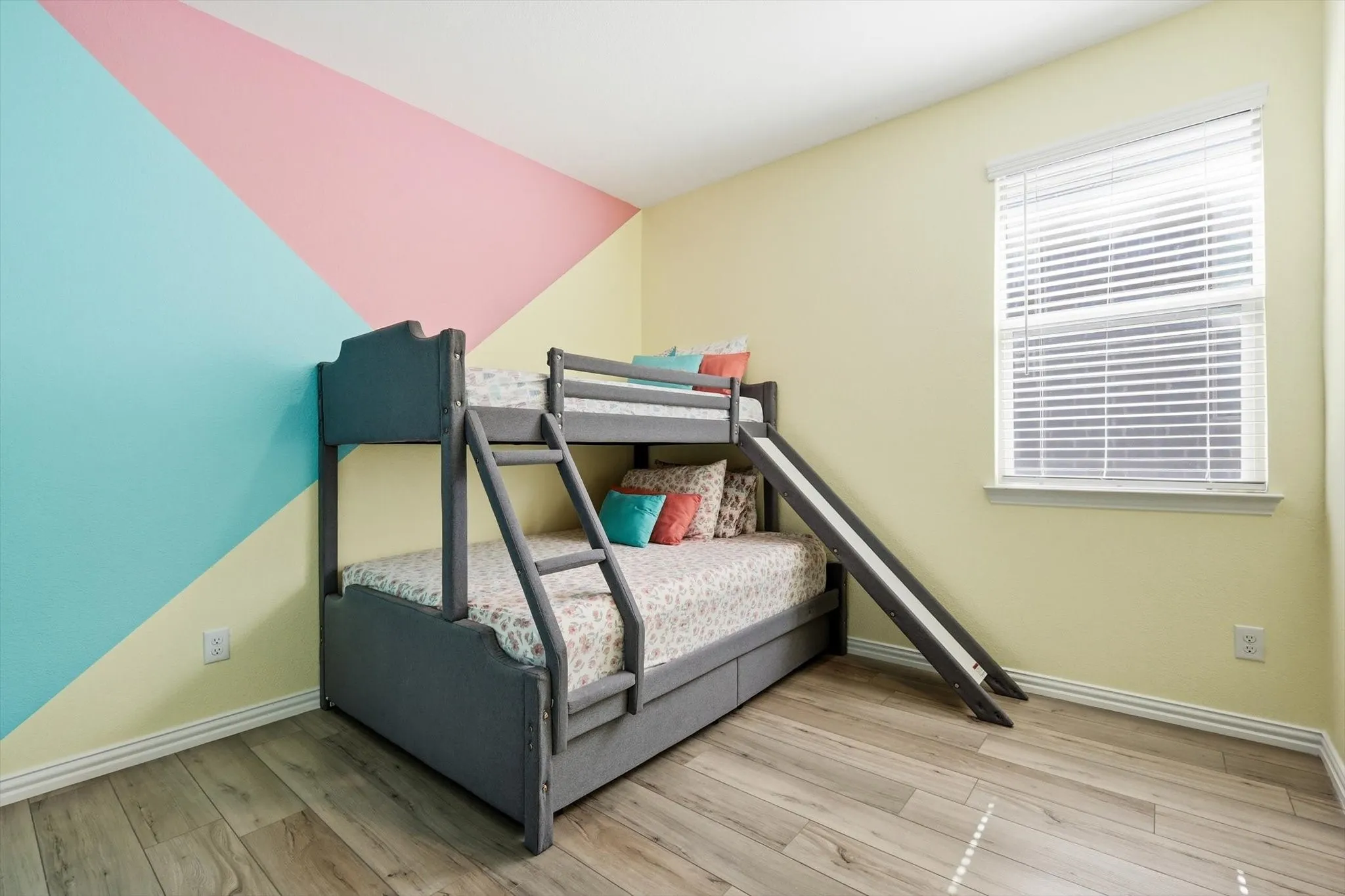 Bedroom 4 with fun graphic wall paint