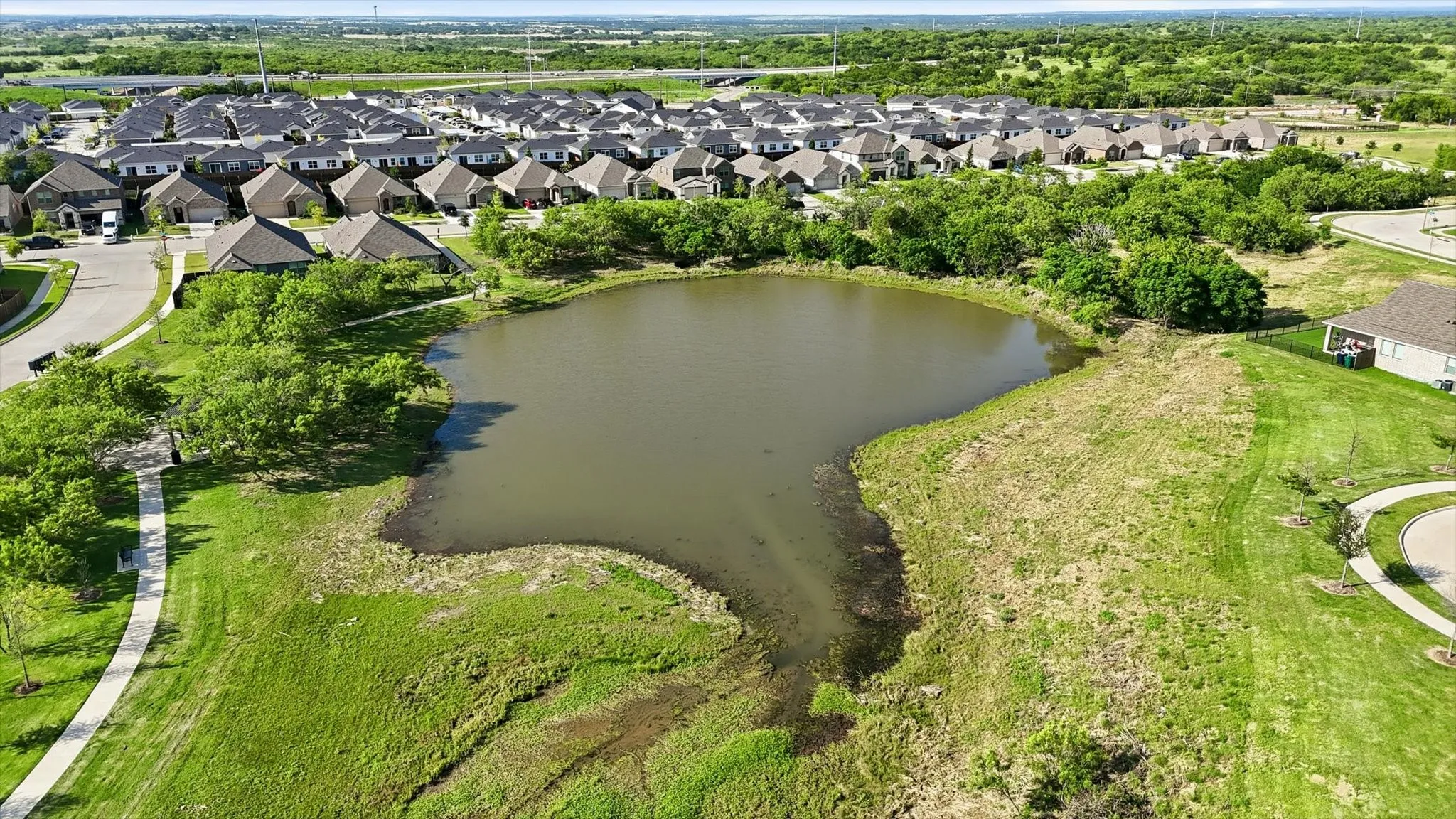 Kings Ridge Estates has its own pond and beautiful parkland surrounding it.