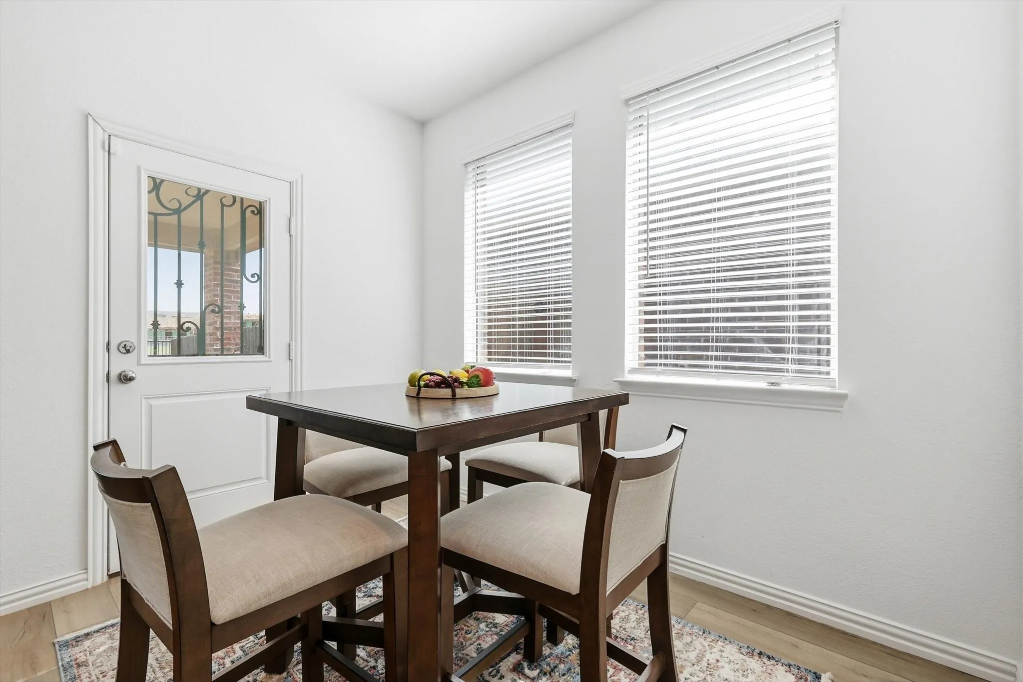 Cozy breakfast nook with direct access to the patio.  The seller added a screen door.