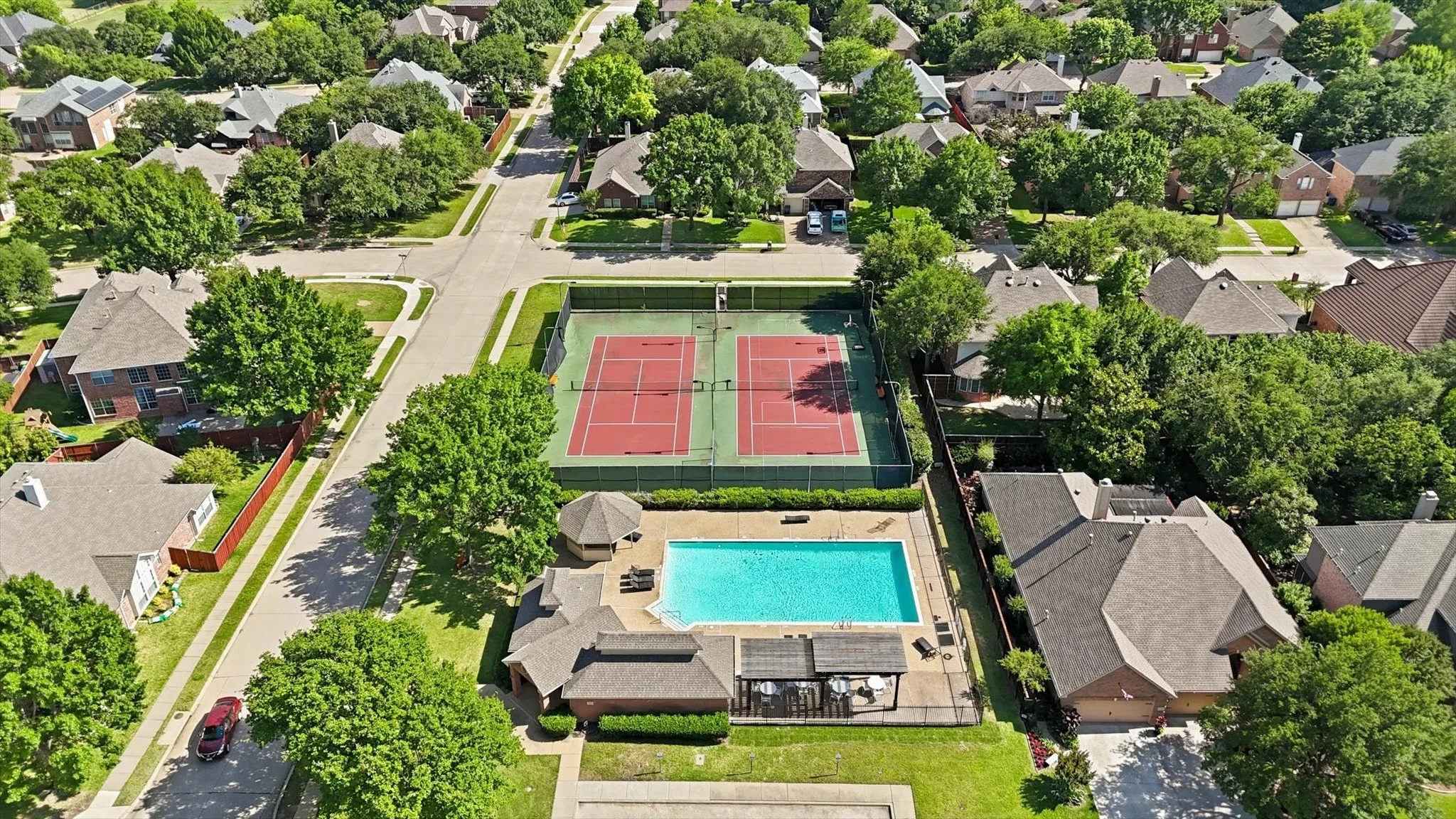 Neighborhood pool and tennis courts