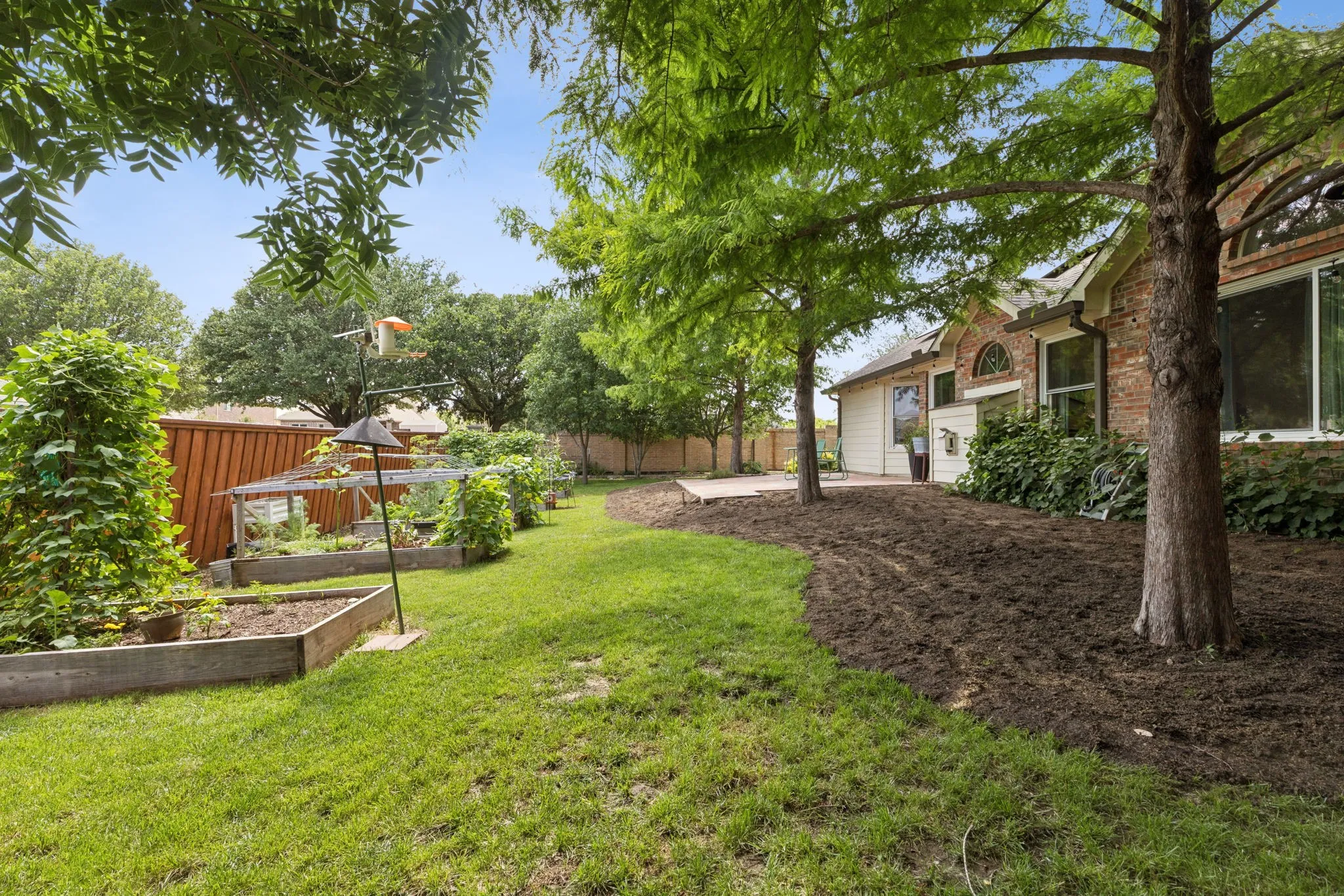 View of the amazing backyard showing the back of the home.
