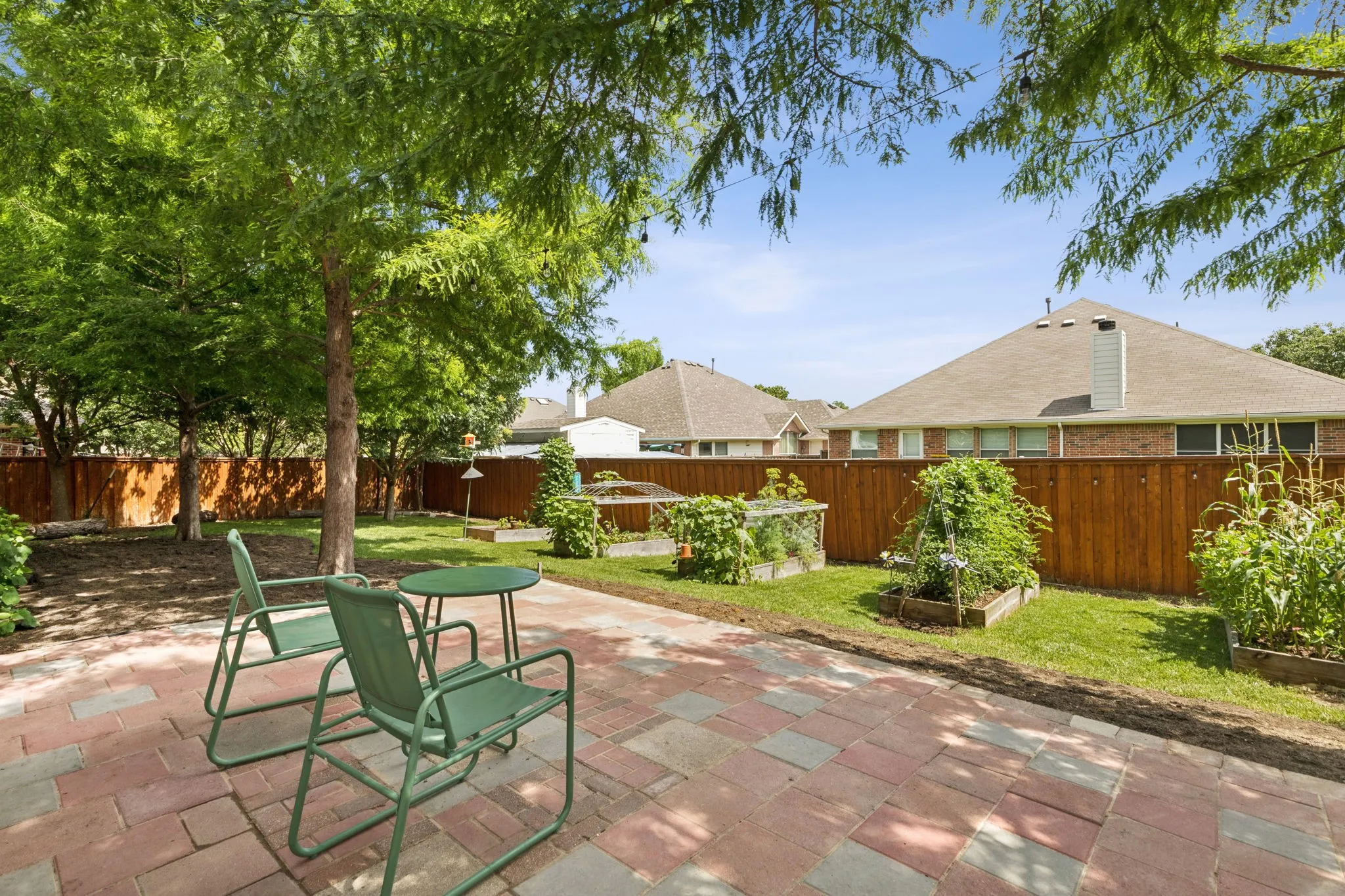 Welcome to 3505 Summer Drive. Enjoy outdoor living on the large patio shaded by lush mature trees. The oversized backyard is home to multiple planting beds ripe with vegetation - tomatoes, green beans, and more!