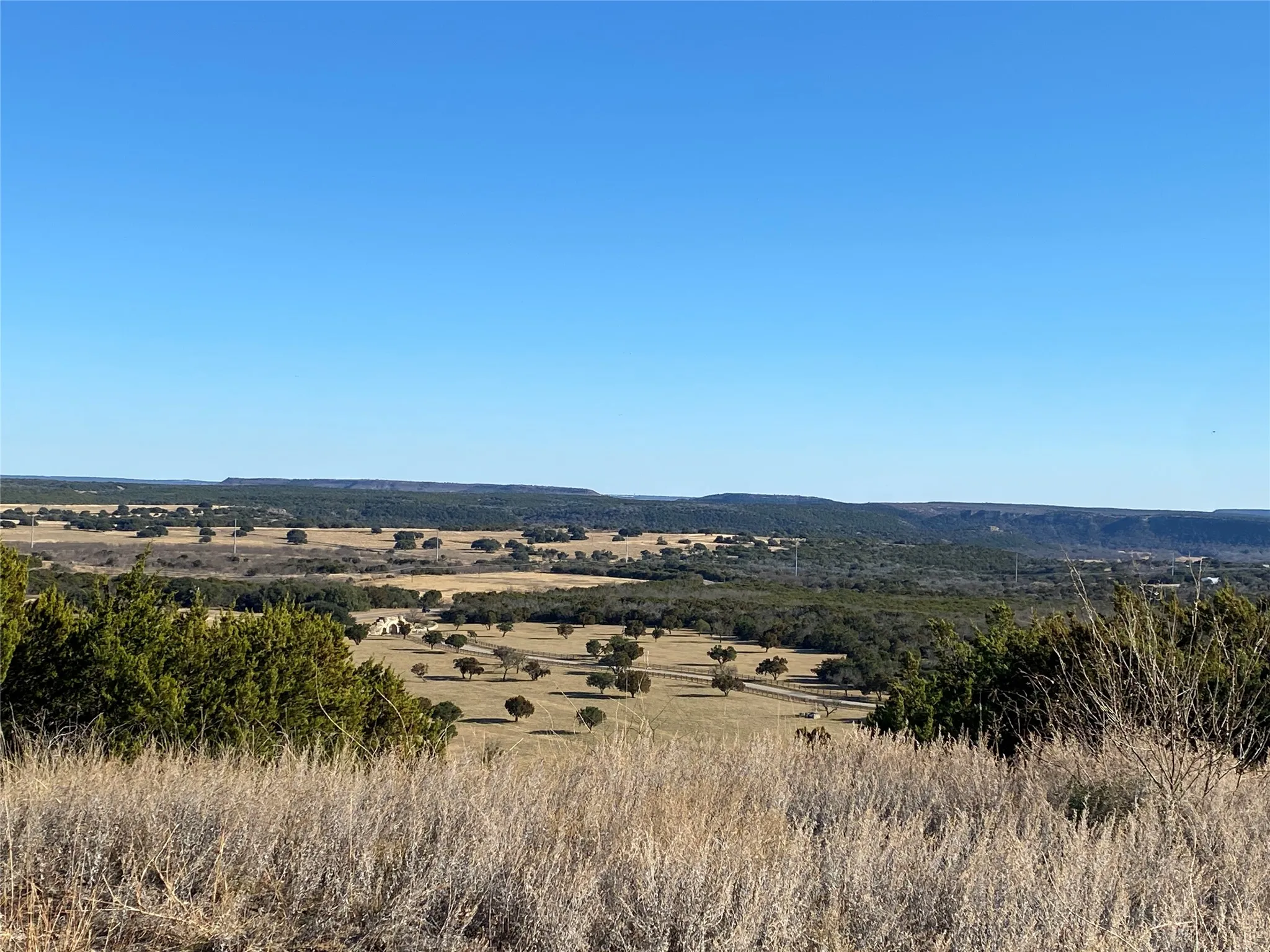 Overlooking front gate from lot