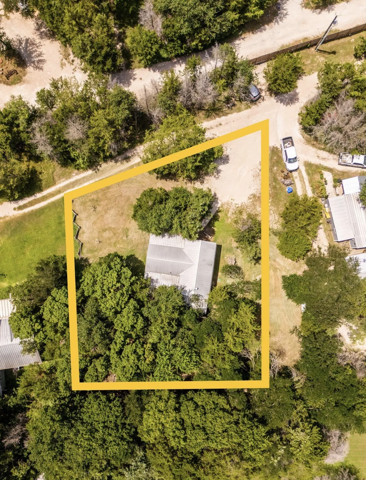 Aerial view highlighting the property boundary