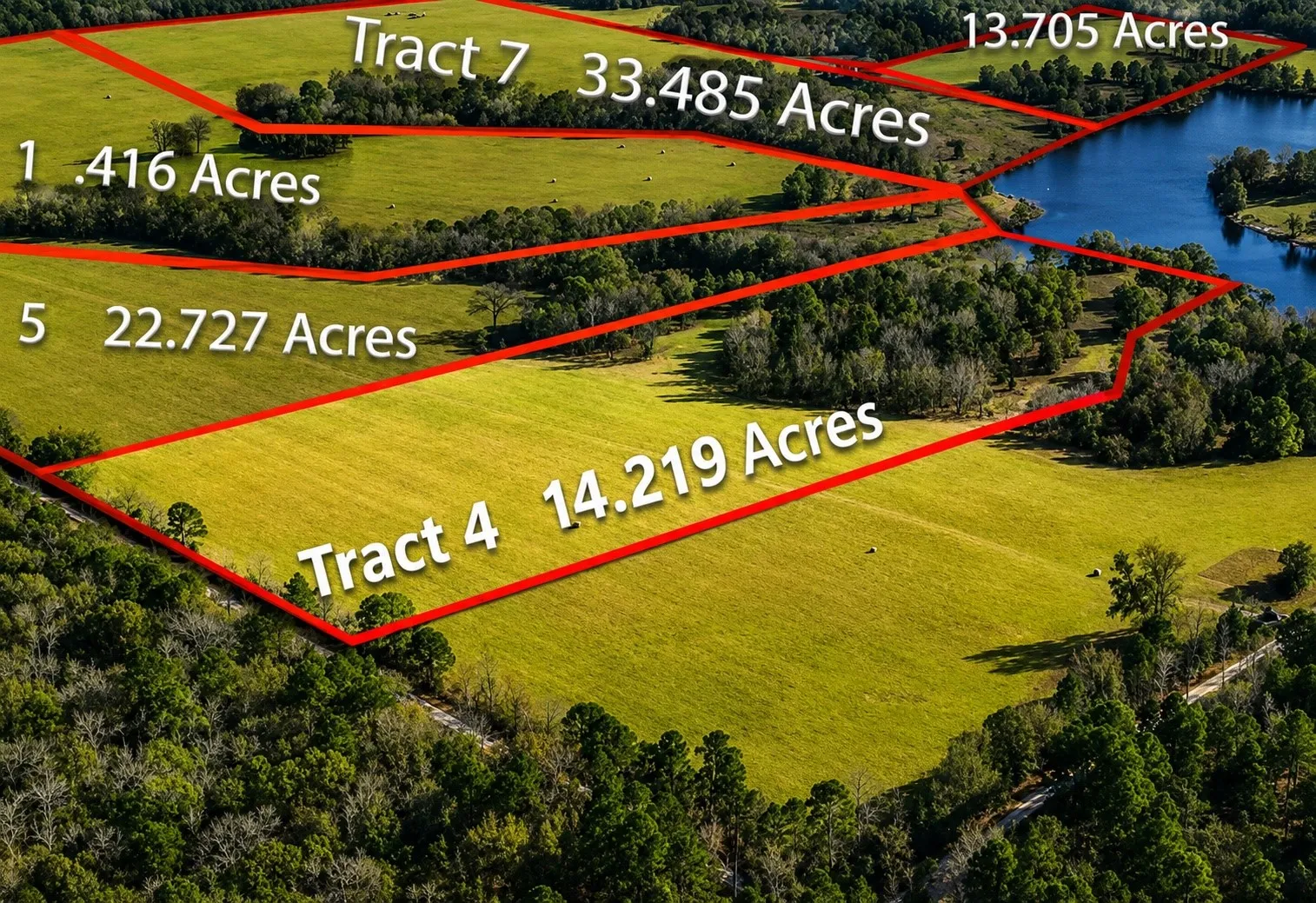 Aerial parcel map featuring multiple tracts of land outlined in red, including Tract 4 at 14.219 acres and Tract 7 at 33.485 acres