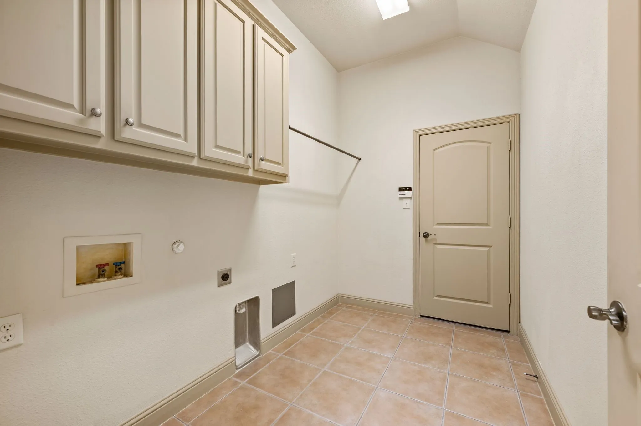 Full Size Utility Room with Built in Cabinets
