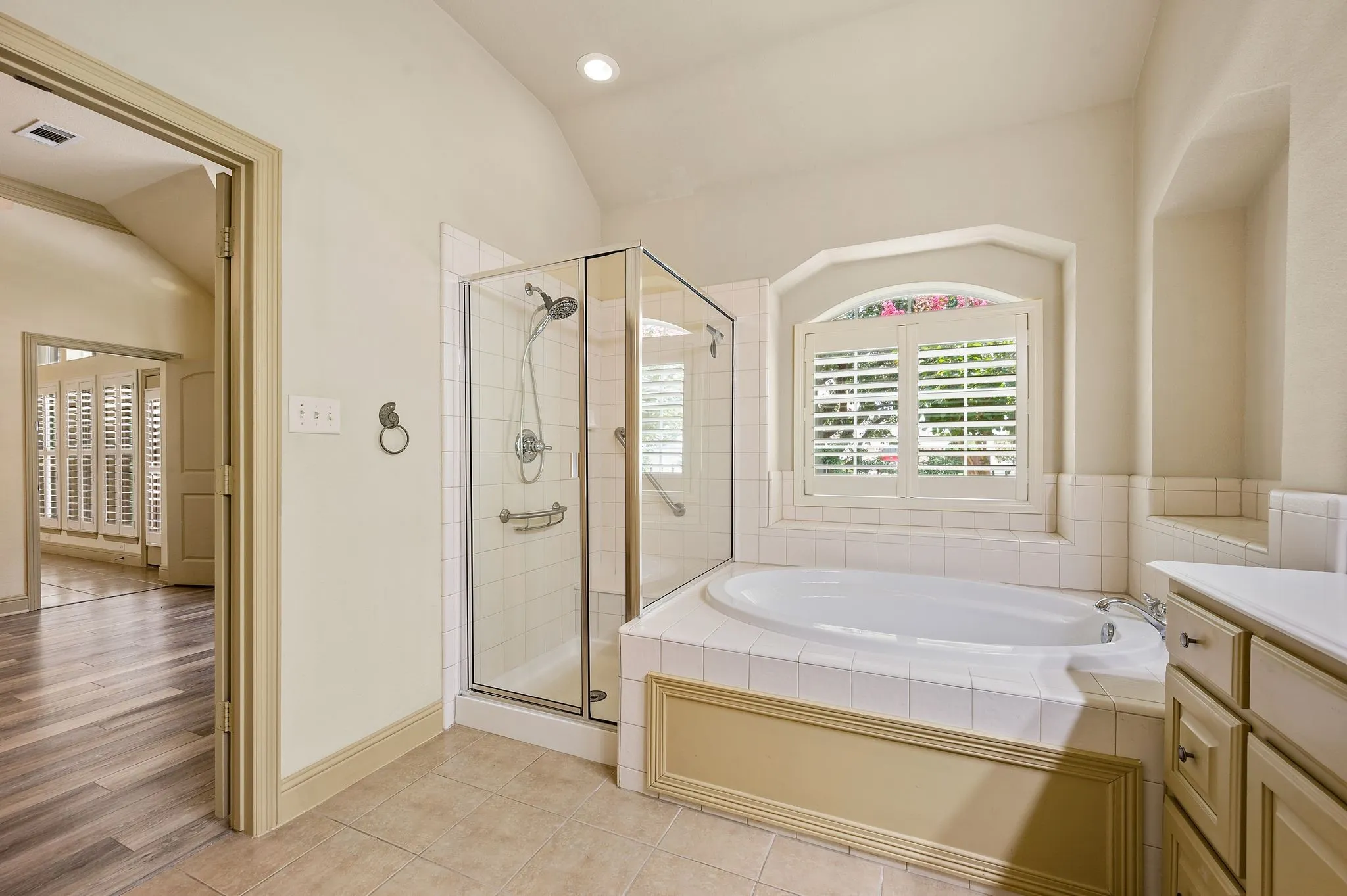 Primary Bathroom with a Garden Tub and Separate Shower
