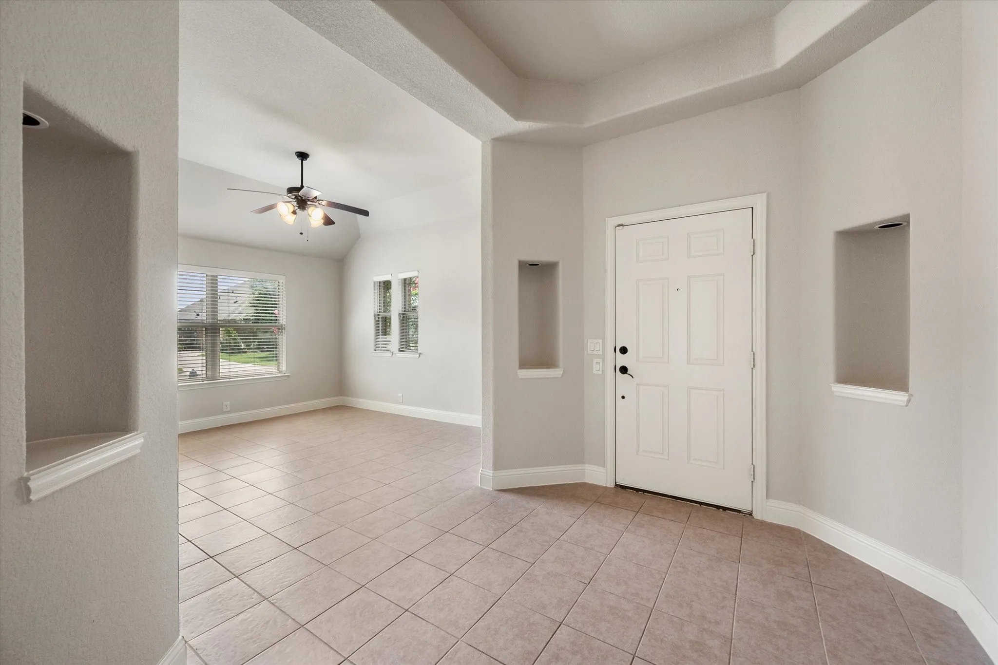 Hallway looking into the formal dining area or could be a flex space