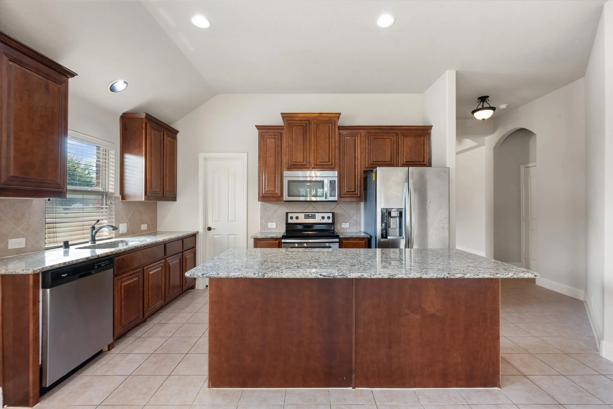 Kitchen with island and lots of cabients