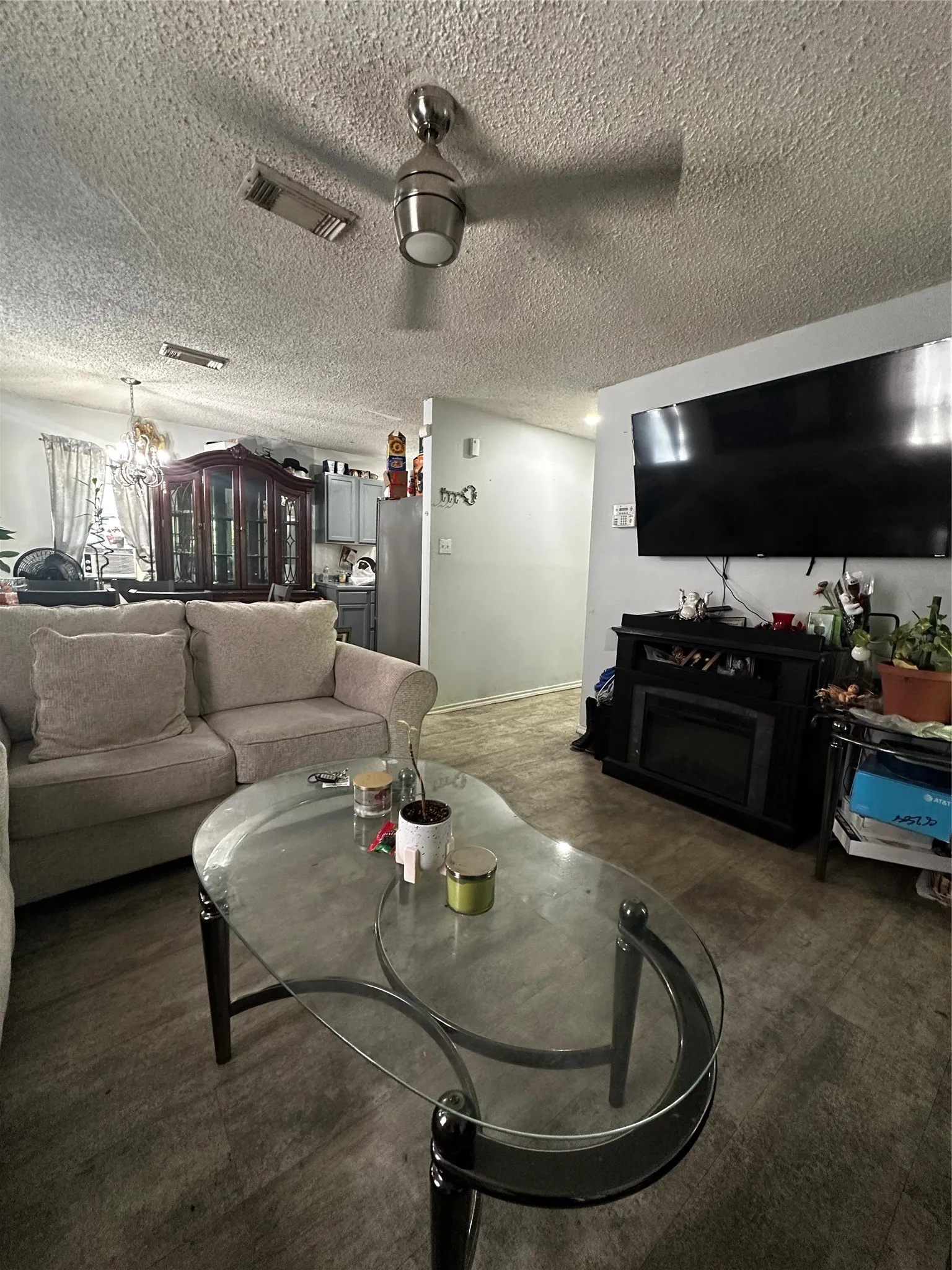 A ceiling fan with integrated lighting, and recessed lighting